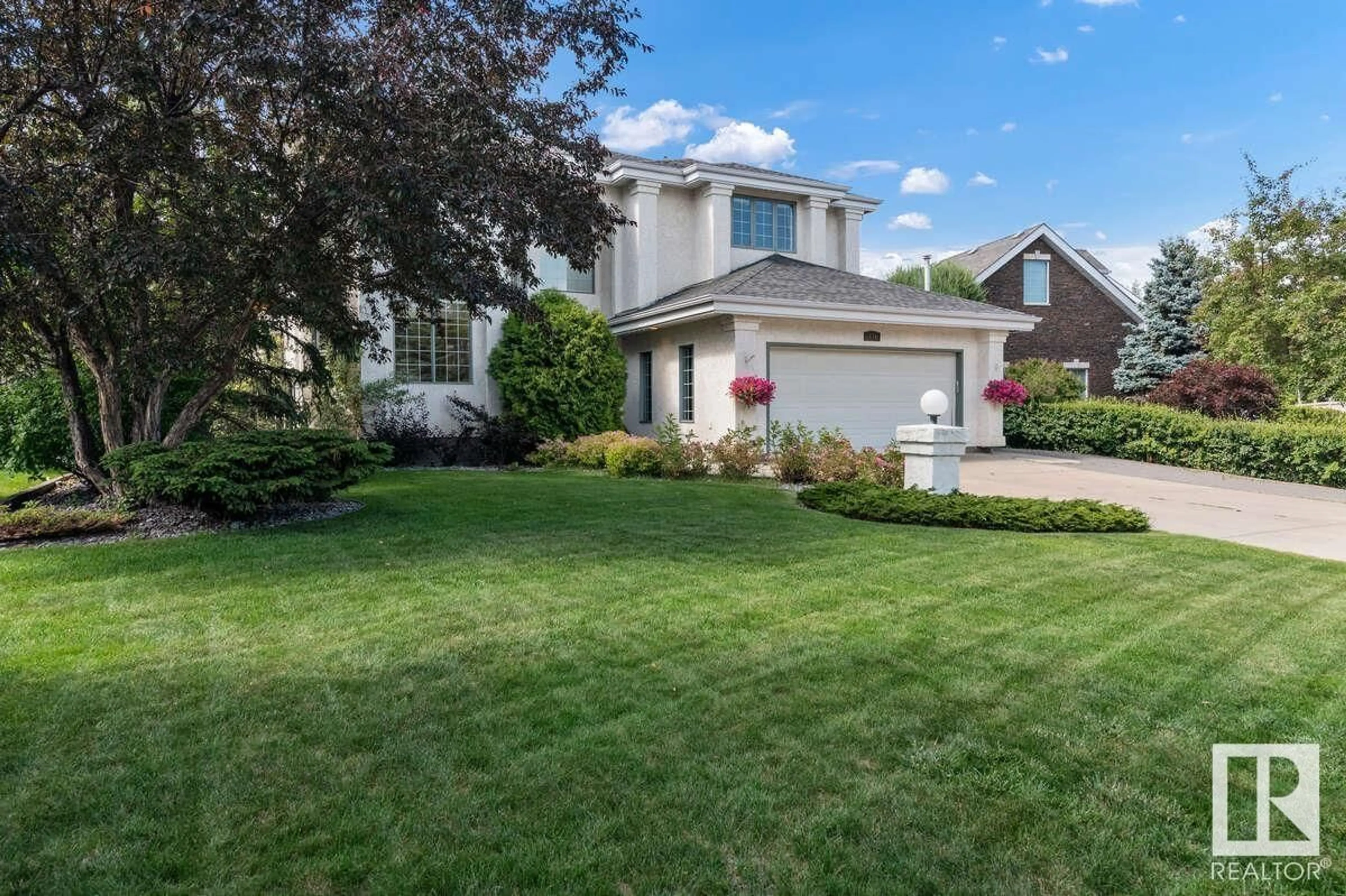Home with vinyl exterior material, street for 434 TWIN BROOKS CR, Edmonton Alberta T6J6W7