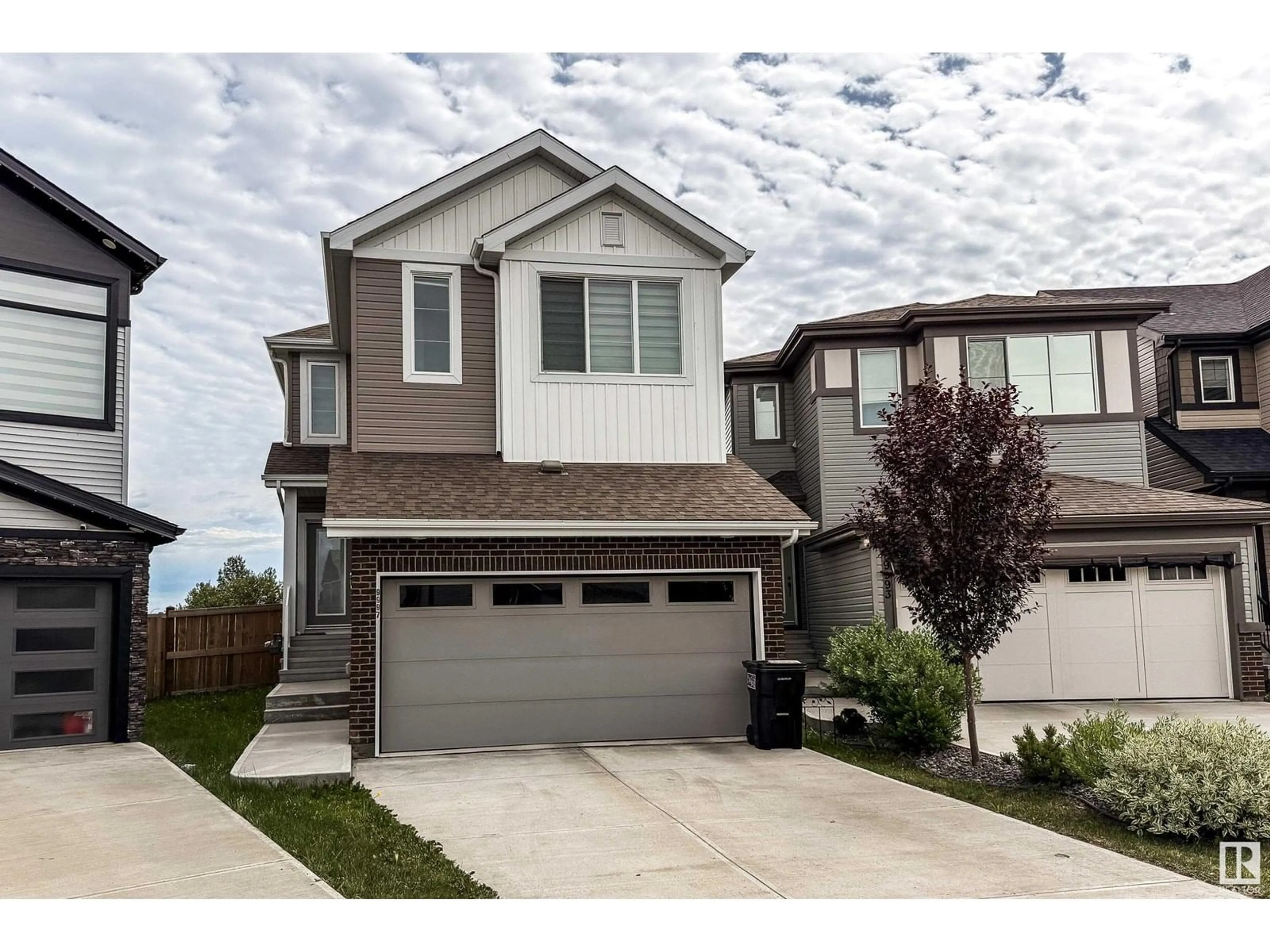 Home with vinyl exterior material, street for NW - 9997 205A ST, Edmonton Alberta T5T7N4