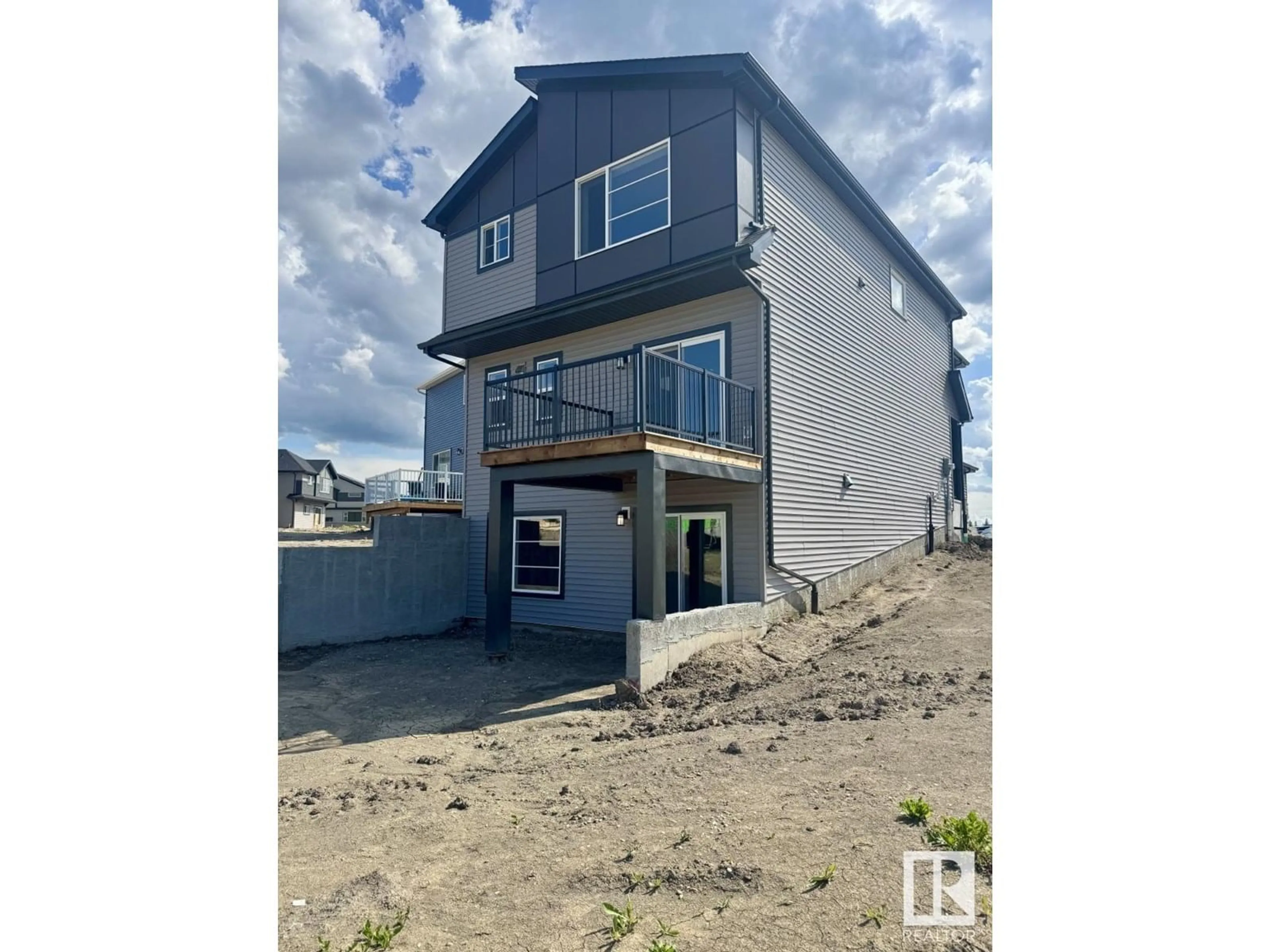 Home with vinyl exterior material, building for NW - 17423 3 ST, Edmonton Alberta T5Y4G7