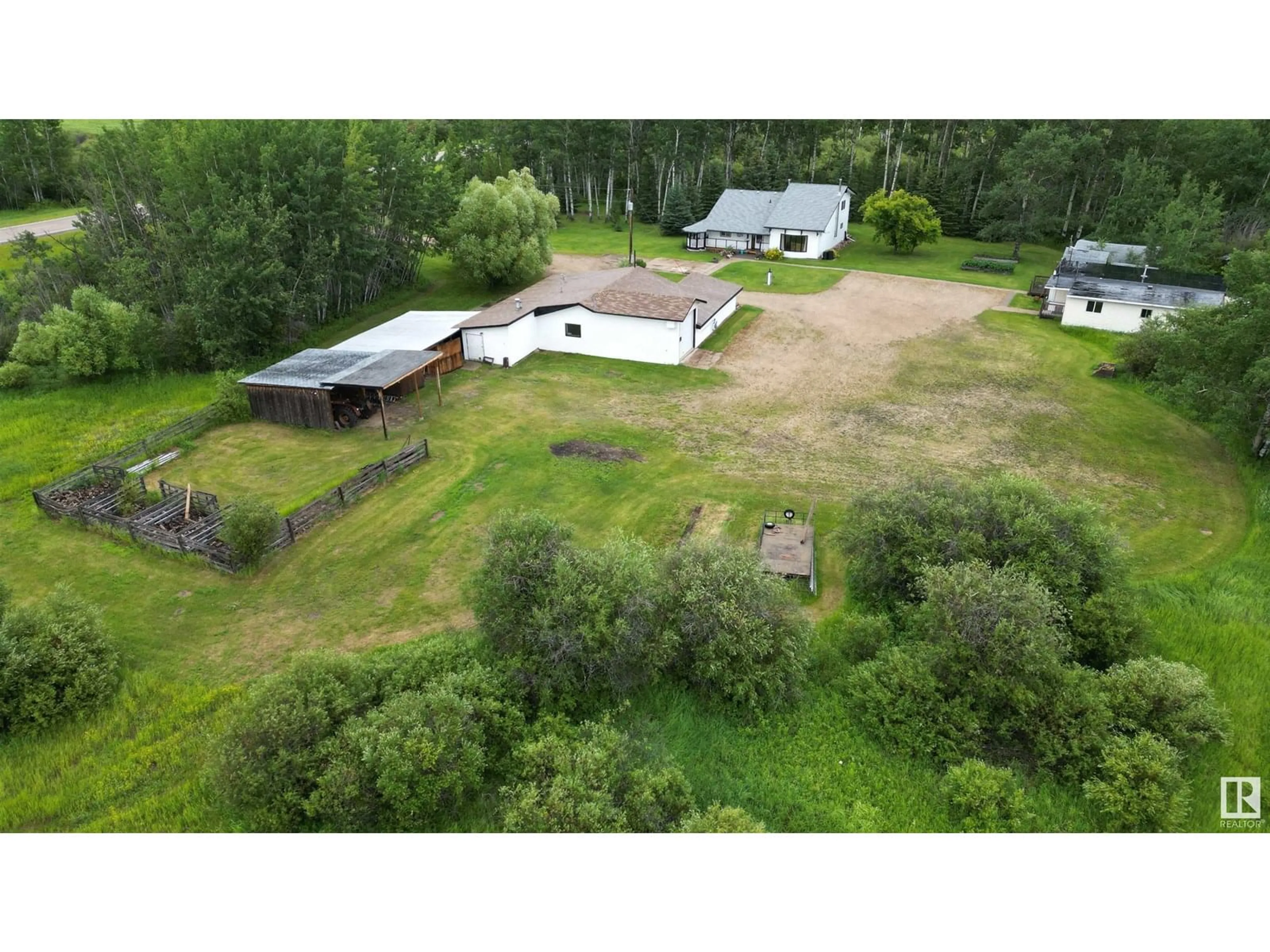 A pic from outside/outdoor area/front of a property/back of a property/a pic from drone, unknown for 8125 HWY 18, Rural Lac Ste. Anne County Alberta T0E1N0