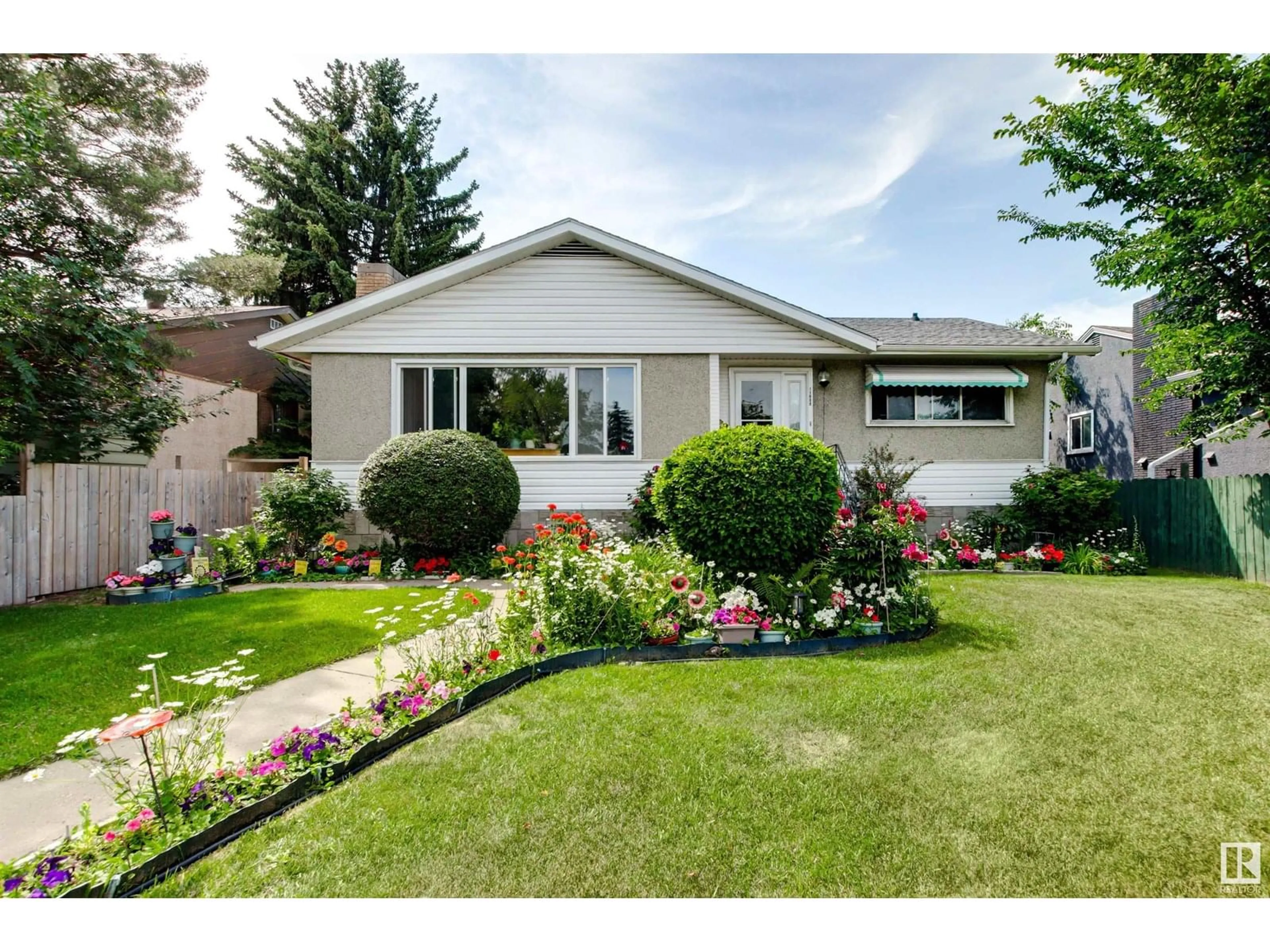 Home with vinyl exterior material, street for 11632 GROAT RD, Edmonton Alberta T5M3K5