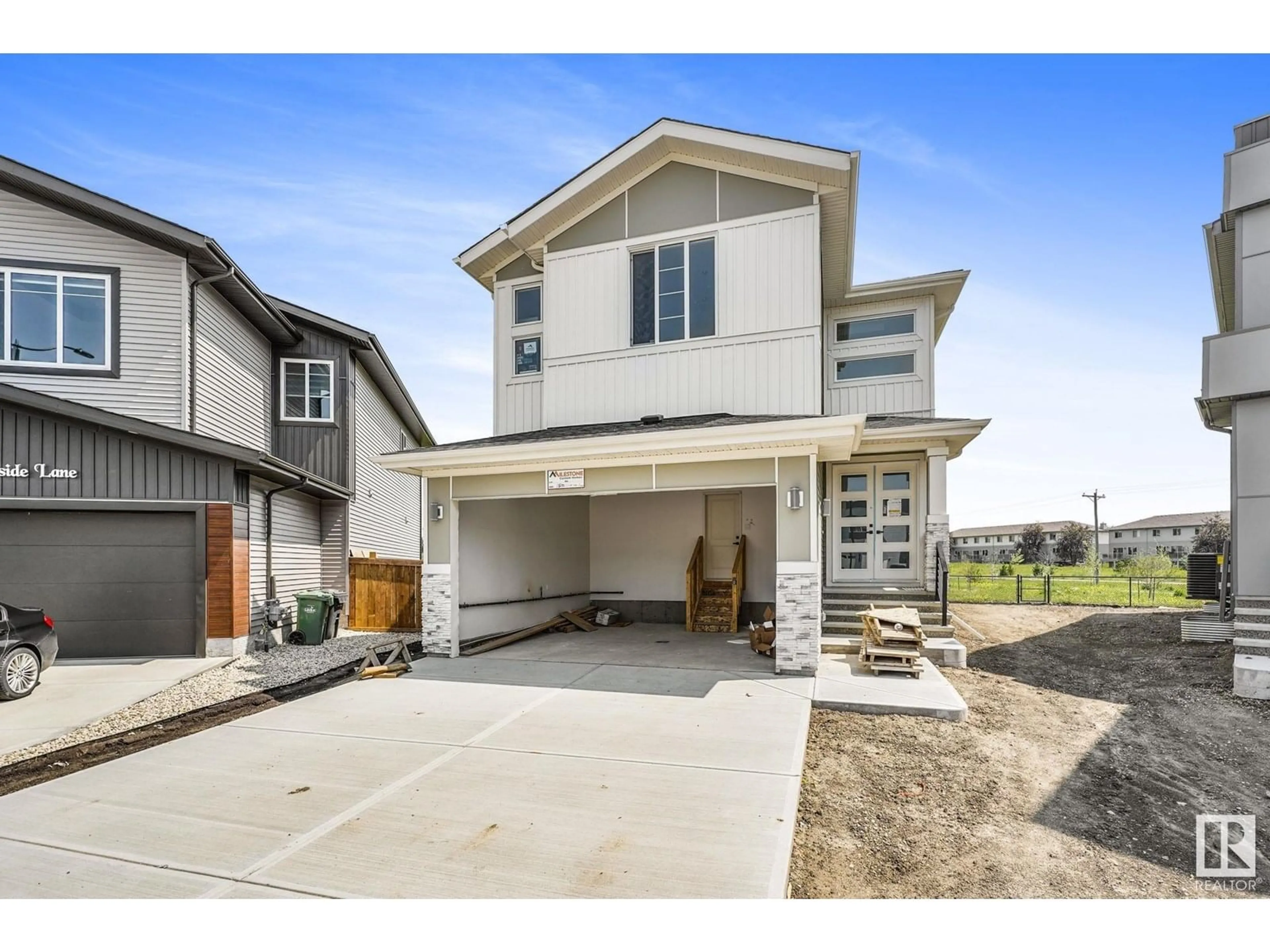 Home with vinyl exterior material, street for 150 CREEKSIDE LANE LN, Leduc Alberta T9E1T1