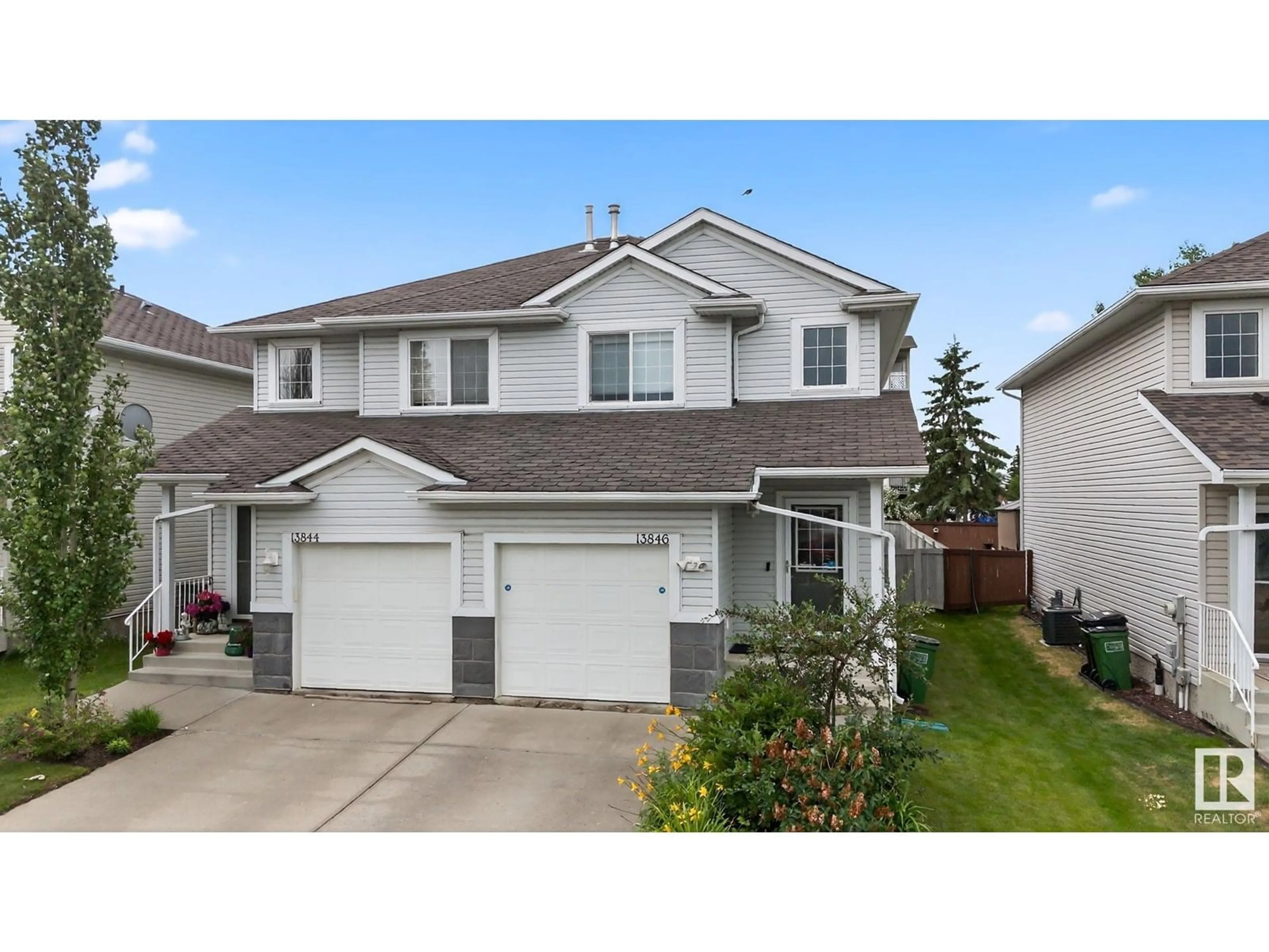 Home with vinyl exterior material, street for 13846 37 ST, Edmonton Alberta T5Y3G4