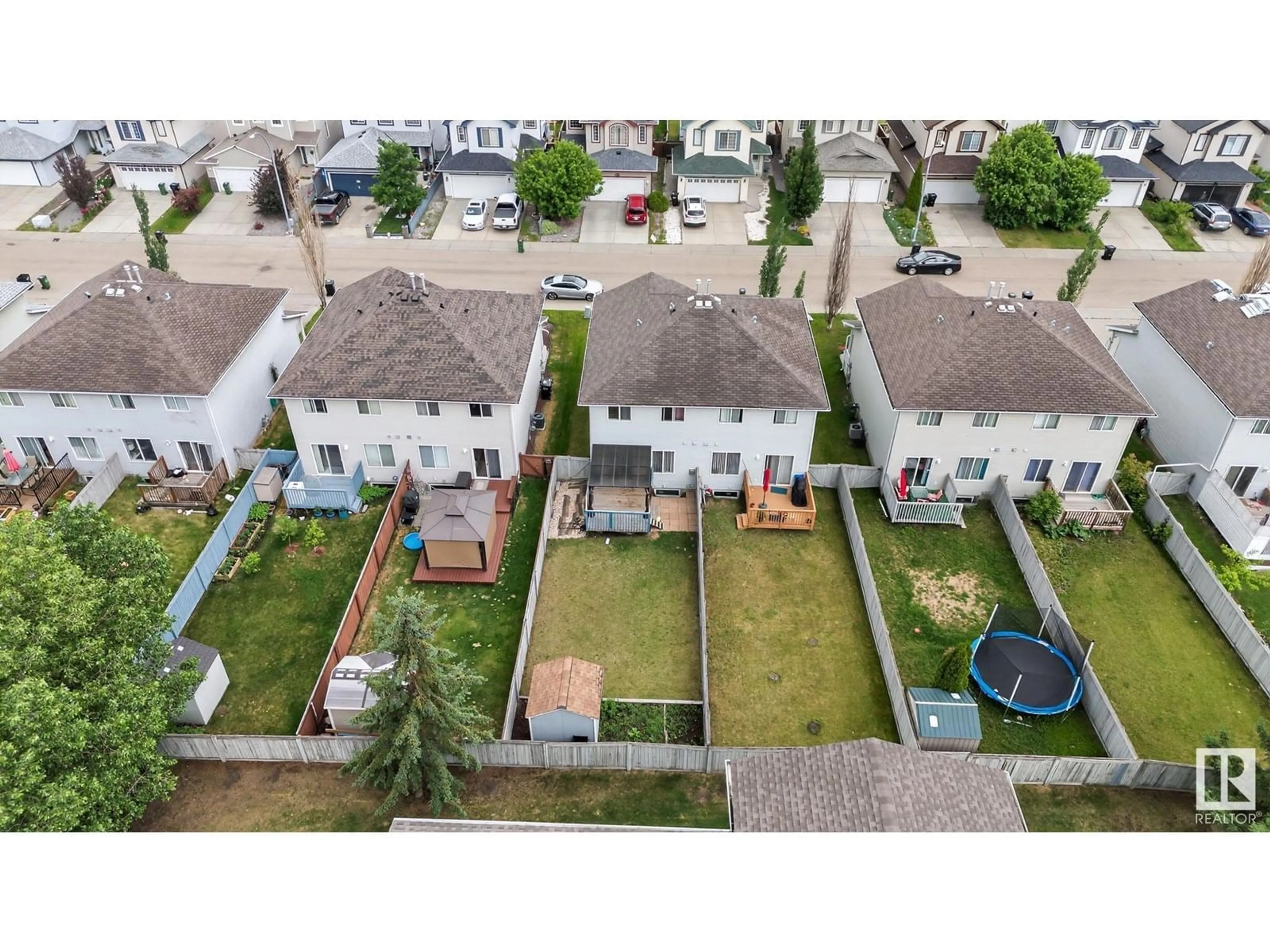 A pic from outside/outdoor area/front of a property/back of a property/a pic from drone, street for 13846 37 ST, Edmonton Alberta T5Y3G4