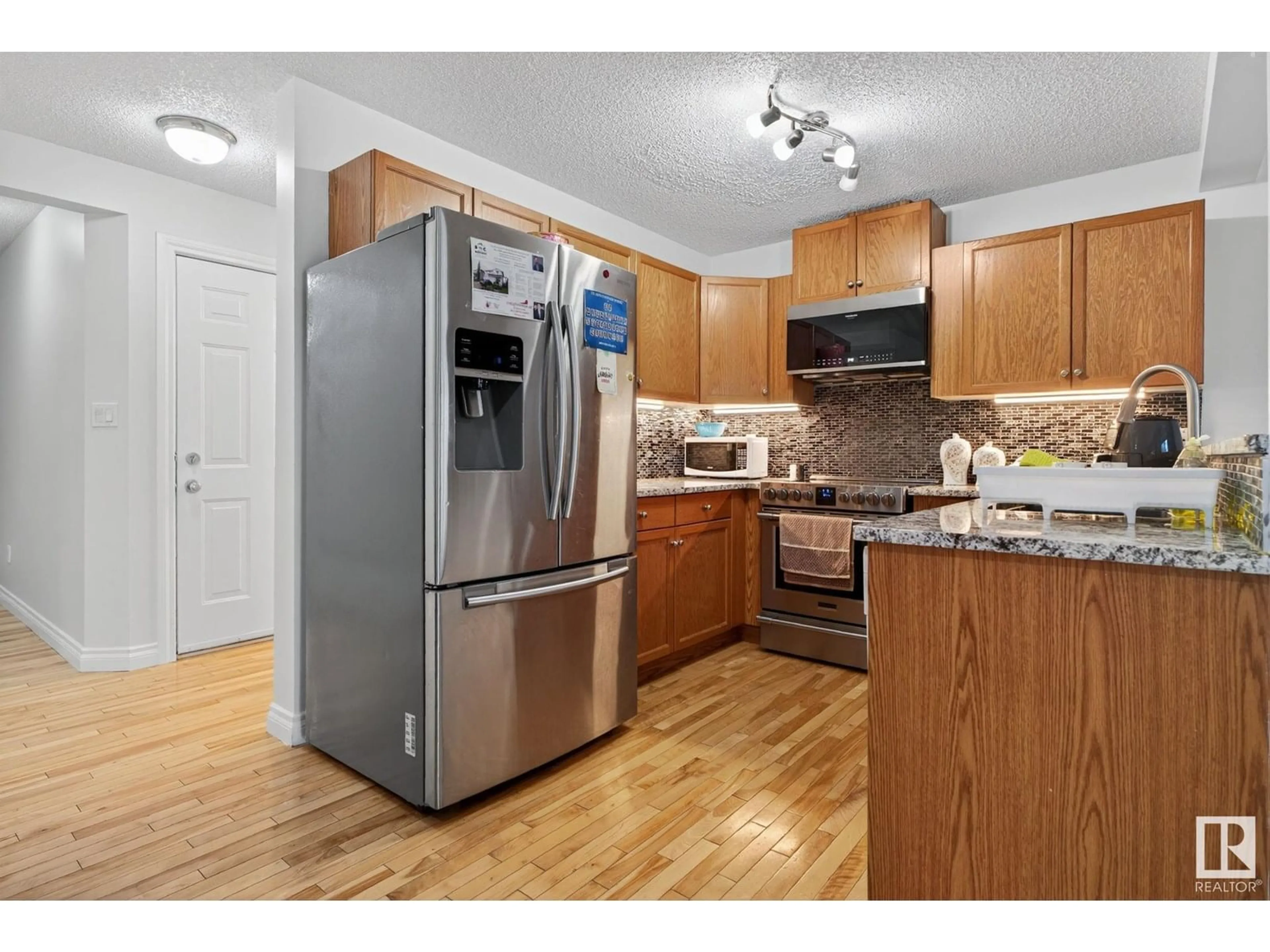 Standard kitchen, wood/laminate floor for 13846 37 ST, Edmonton Alberta T5Y3G4