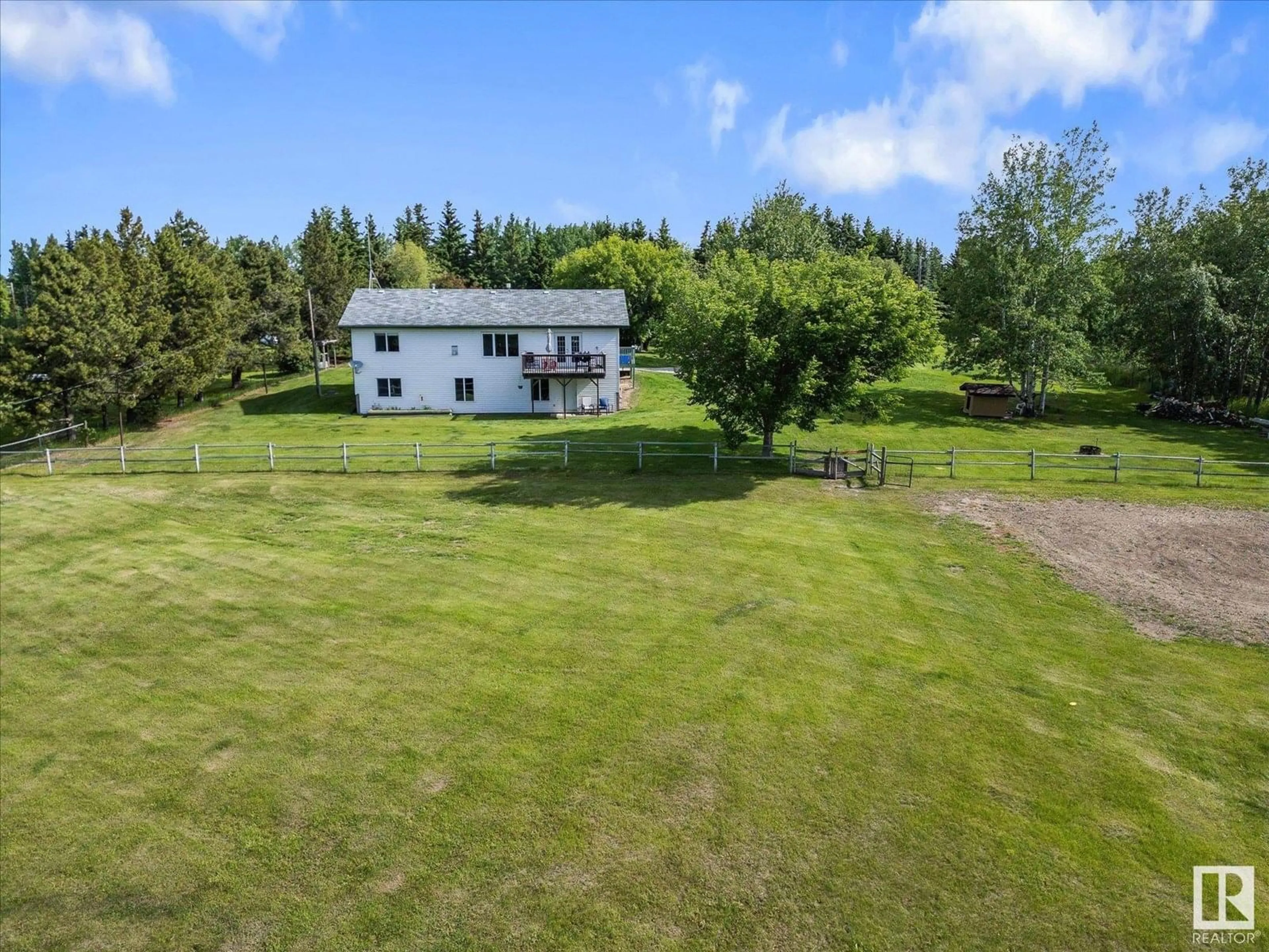 A pic from outside/outdoor area/front of a property/back of a property/a pic from drone, water/lake/river/ocean view for 5 RGE RD 14, Rural Parkland County Alberta T7Y0C2