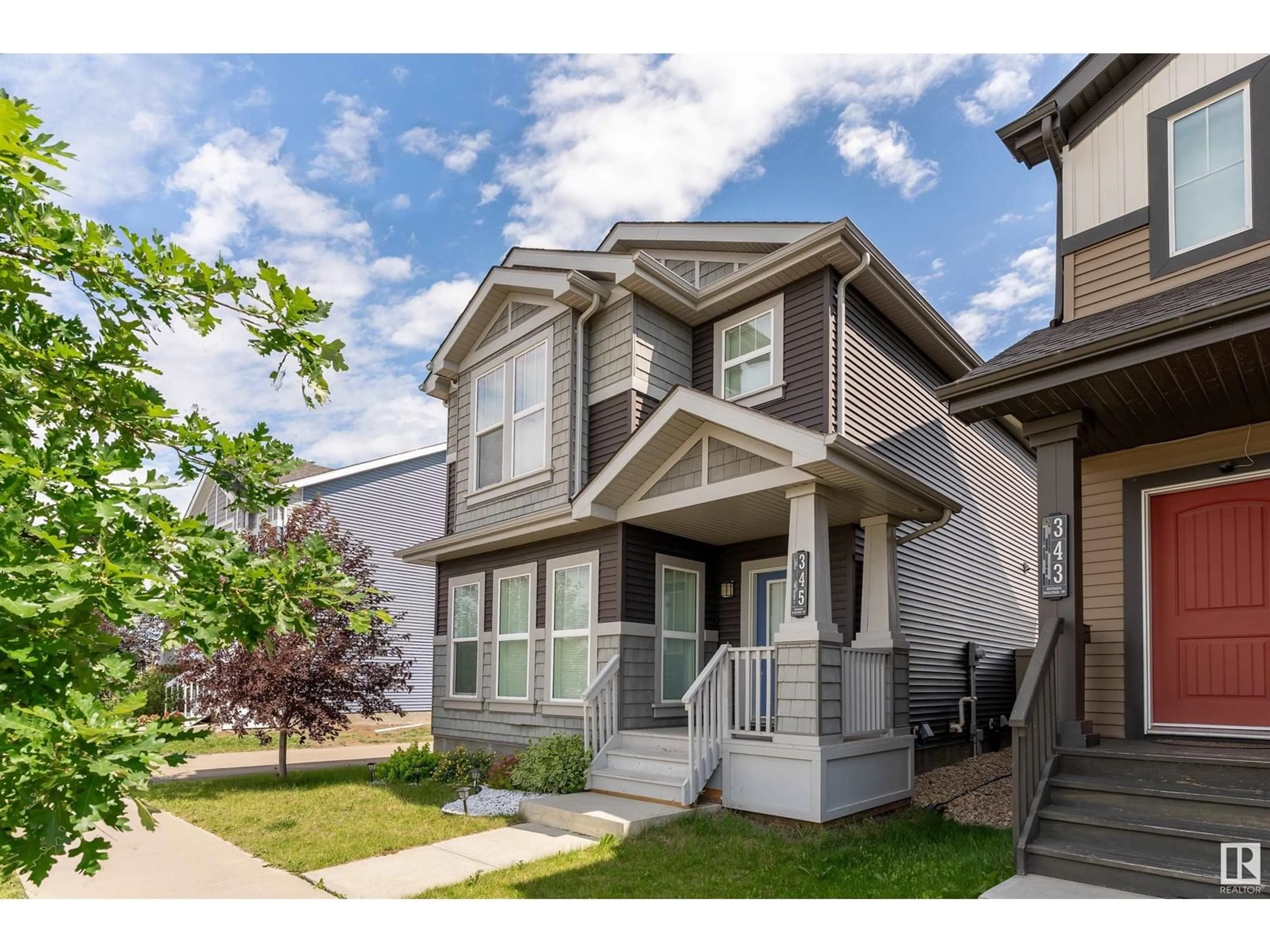 Home with vinyl exterior material, street for 345 ORCHARDS BV, Edmonton Alberta T6X1Y9