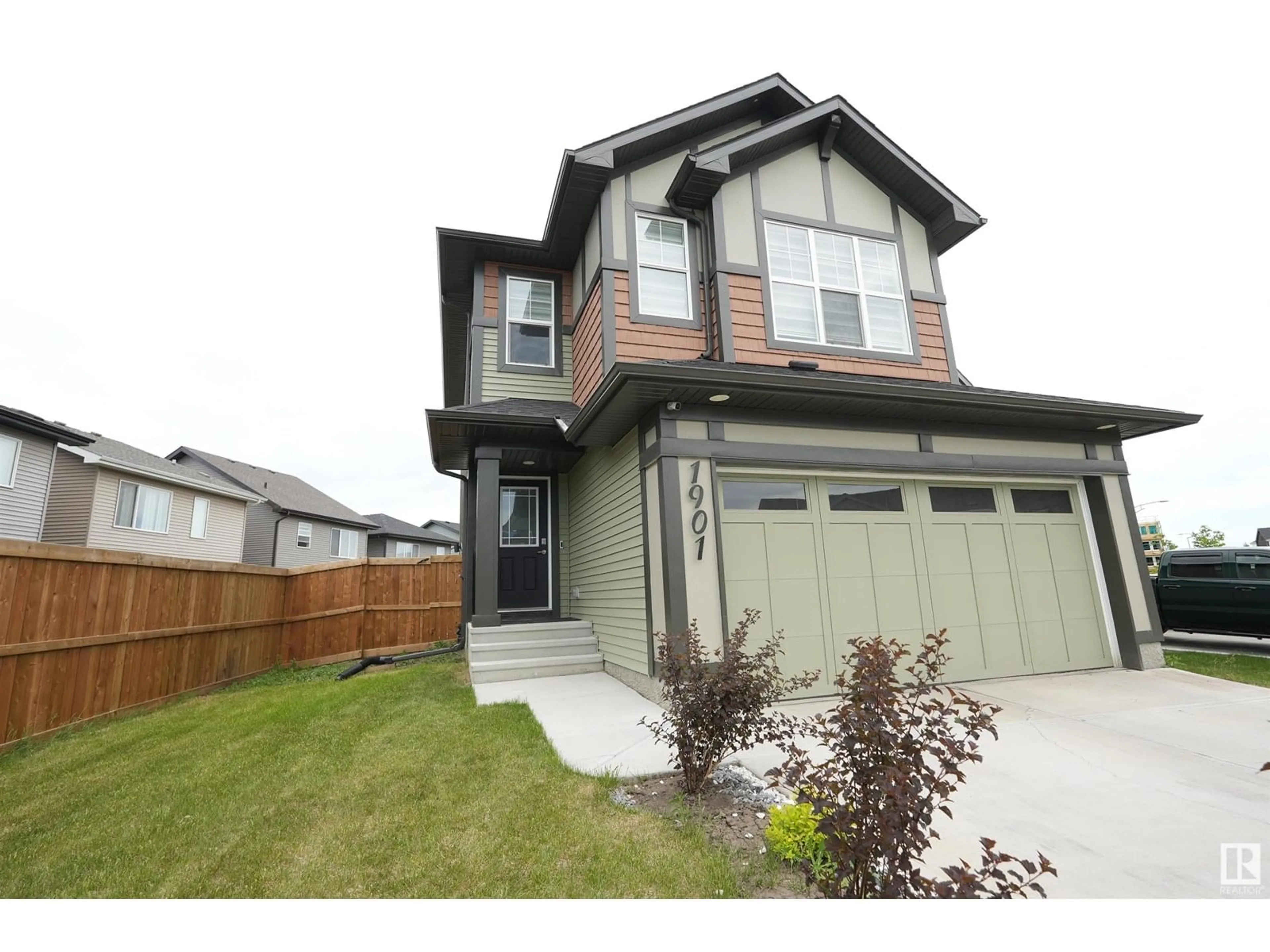 Home with vinyl exterior material, street for SW SW - 1901 COLLIP VW, Edmonton Alberta T6W5C7