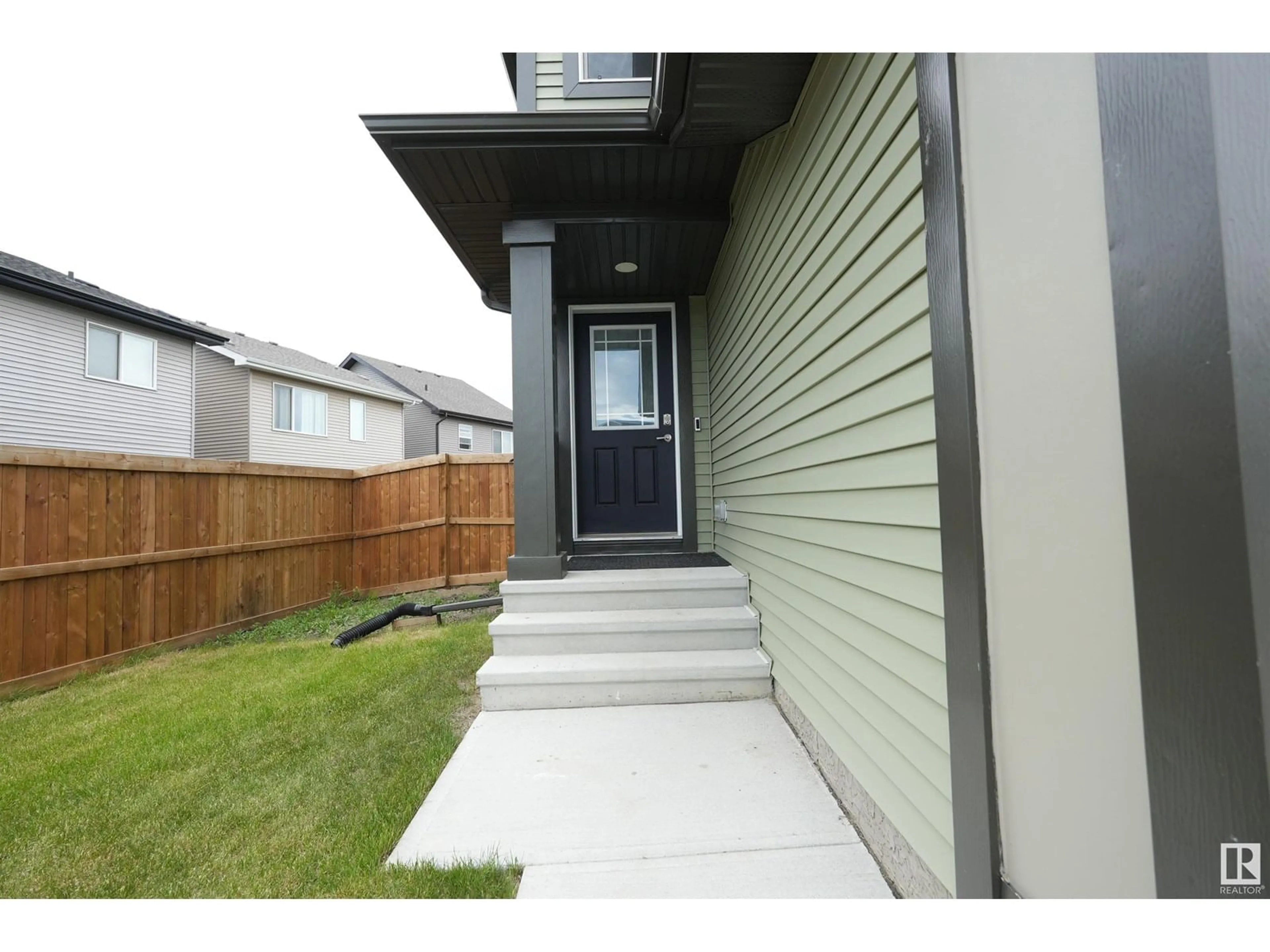 Home with vinyl exterior material, street for SW SW - 1901 COLLIP VW, Edmonton Alberta T6W5C7