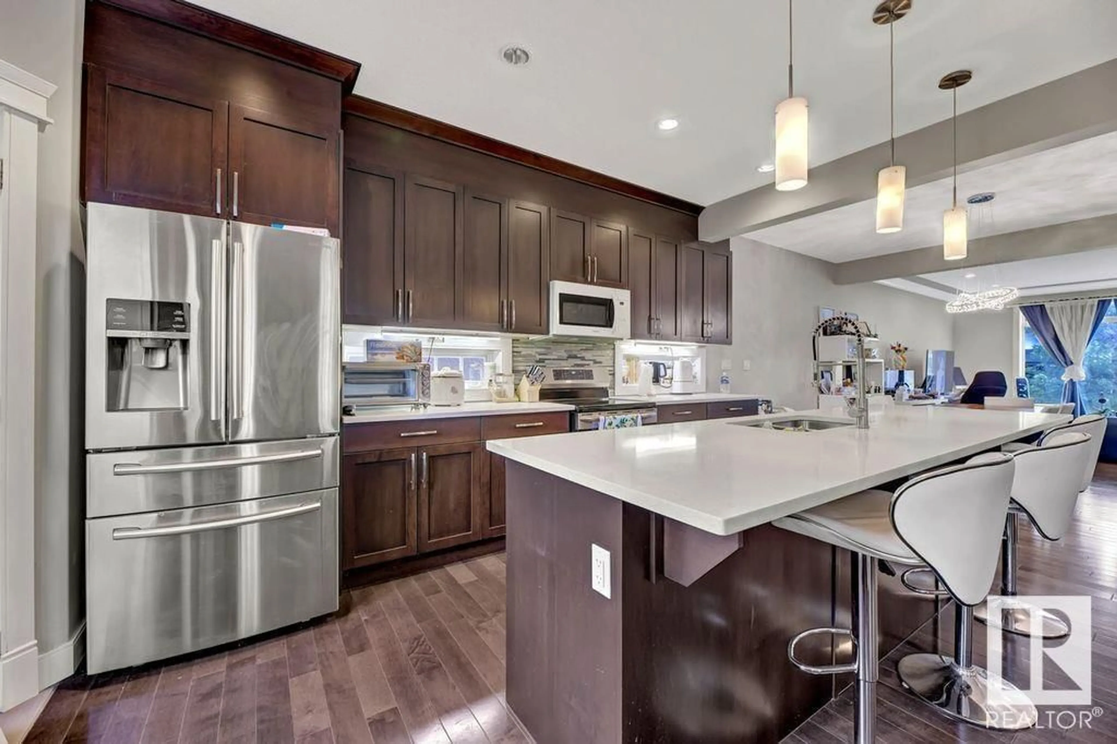 Open concept kitchen, unknown for 10806 72 AV, Edmonton Alberta T6E1A3