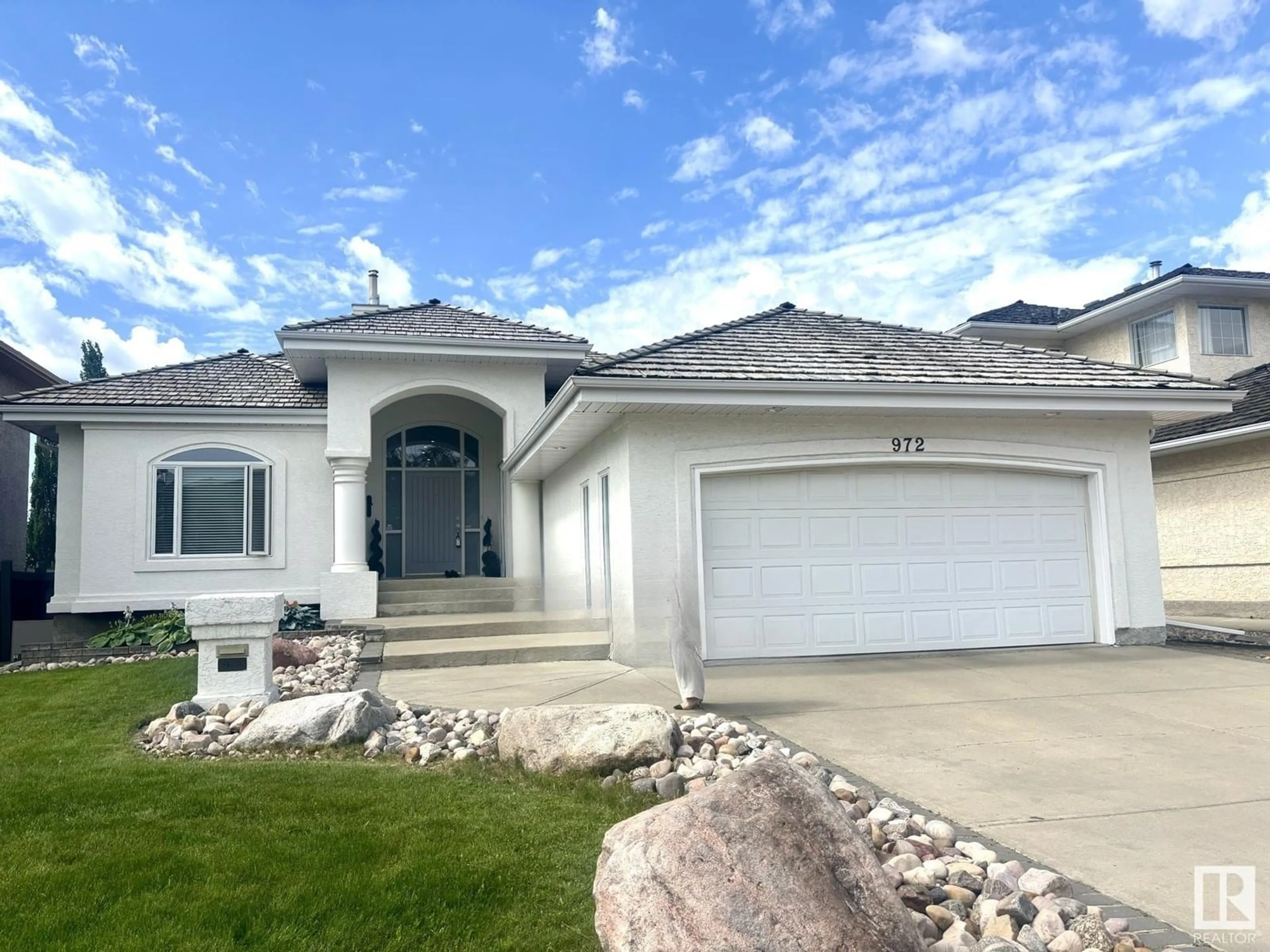 Home with vinyl exterior material, street for 972 WALLBRIDGE PL, Edmonton Alberta T6M2L7