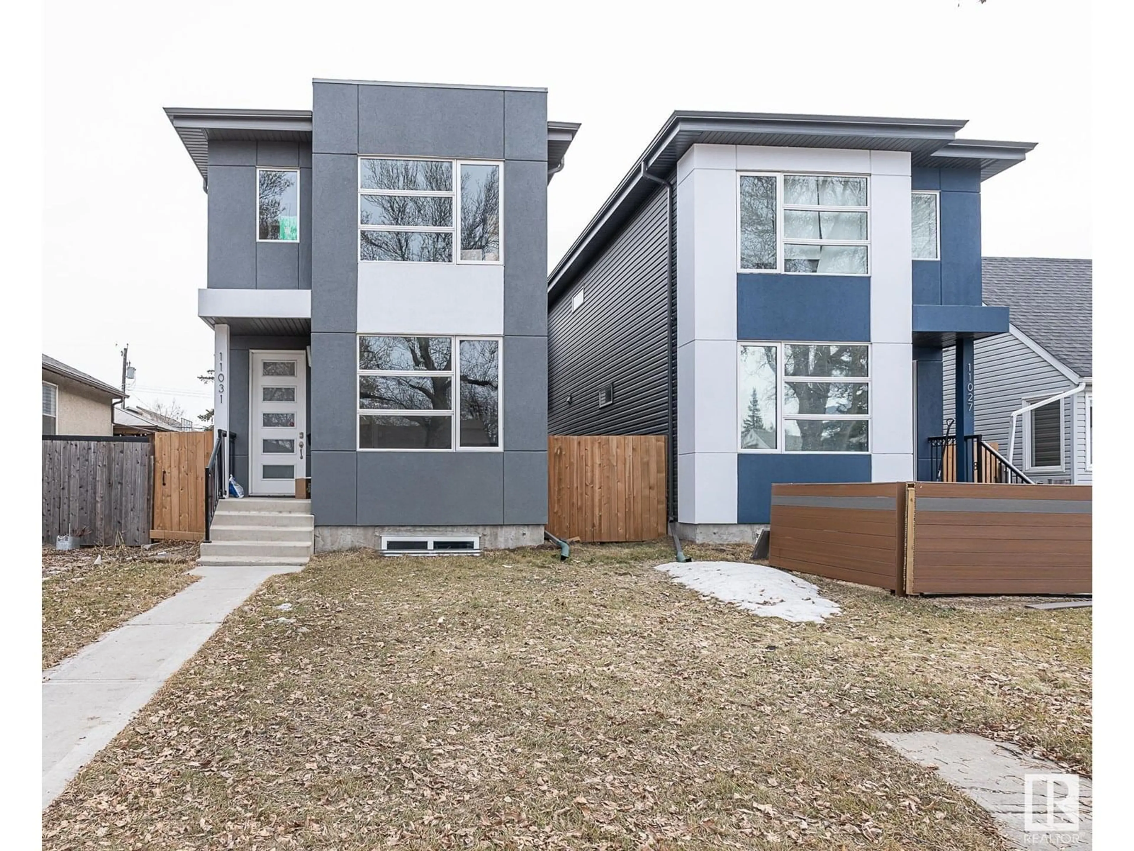 Home with vinyl exterior material, street for NW - 11031 132 ST, Edmonton Alberta T5M1E4