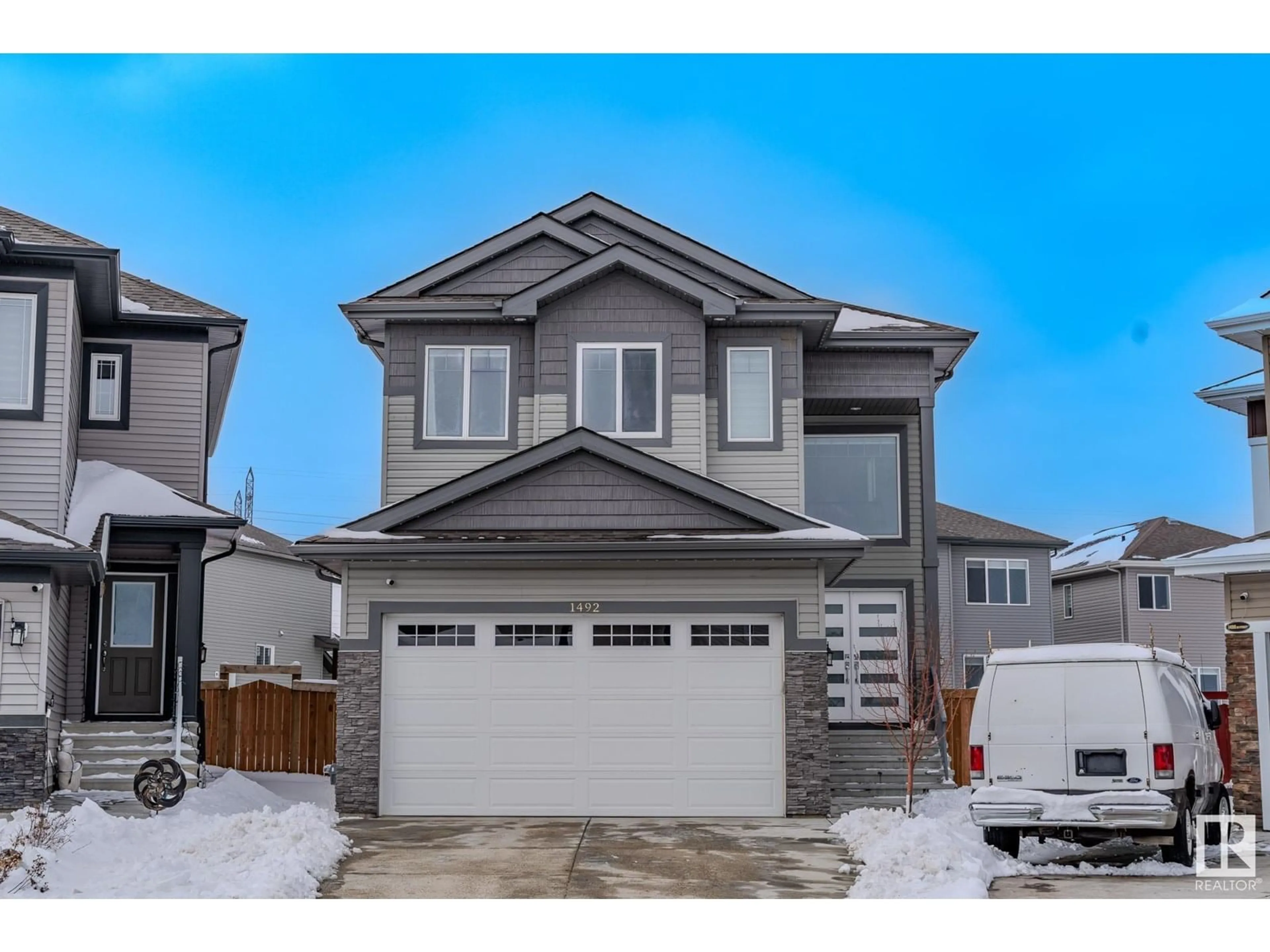 Home with vinyl exterior material, street for 1492 25 STREET, Edmonton Alberta T6T2L3