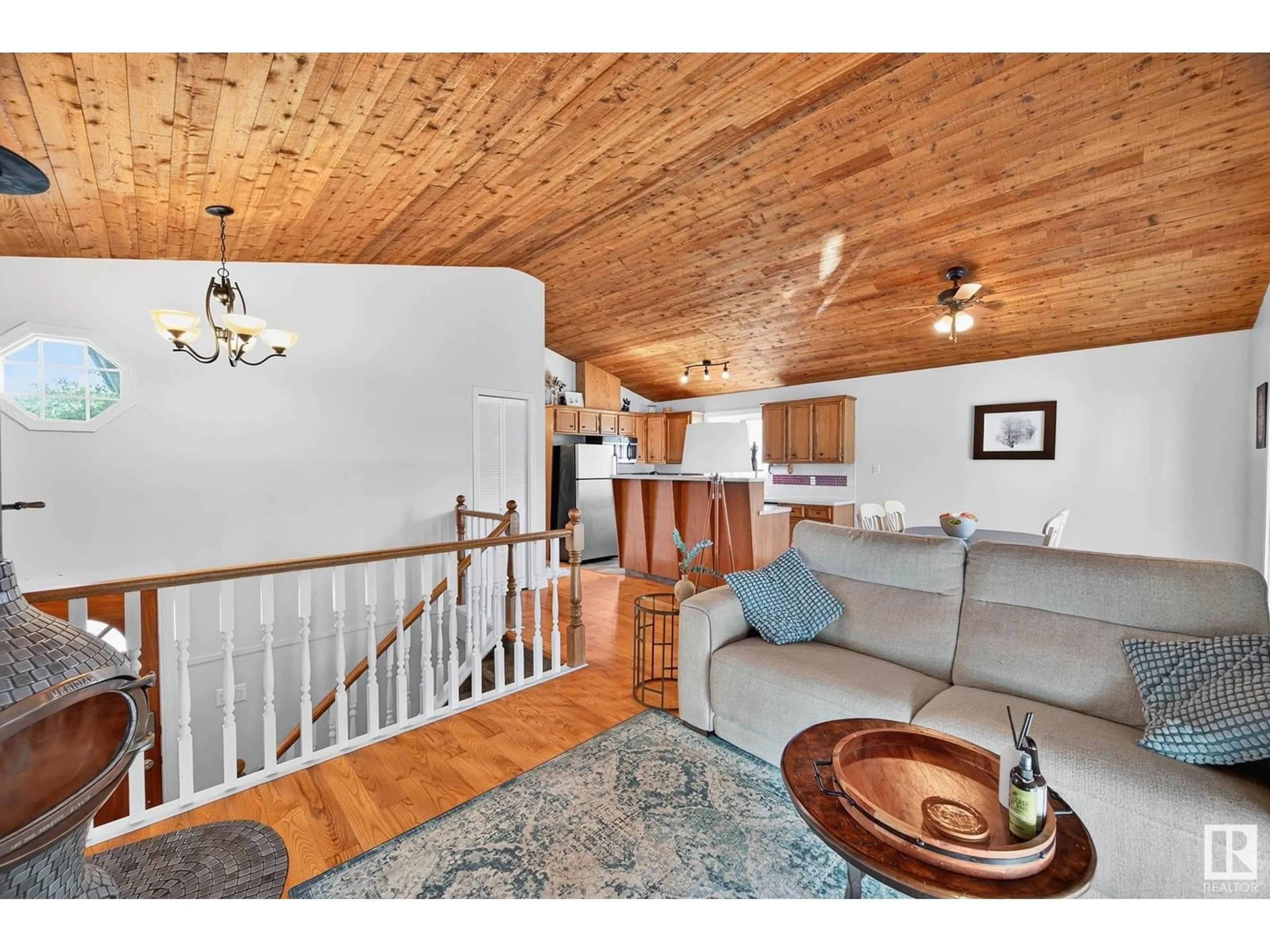 Living room with furniture, wood/laminate floor for 5606 186 ST, Edmonton Alberta T6M1Z9
