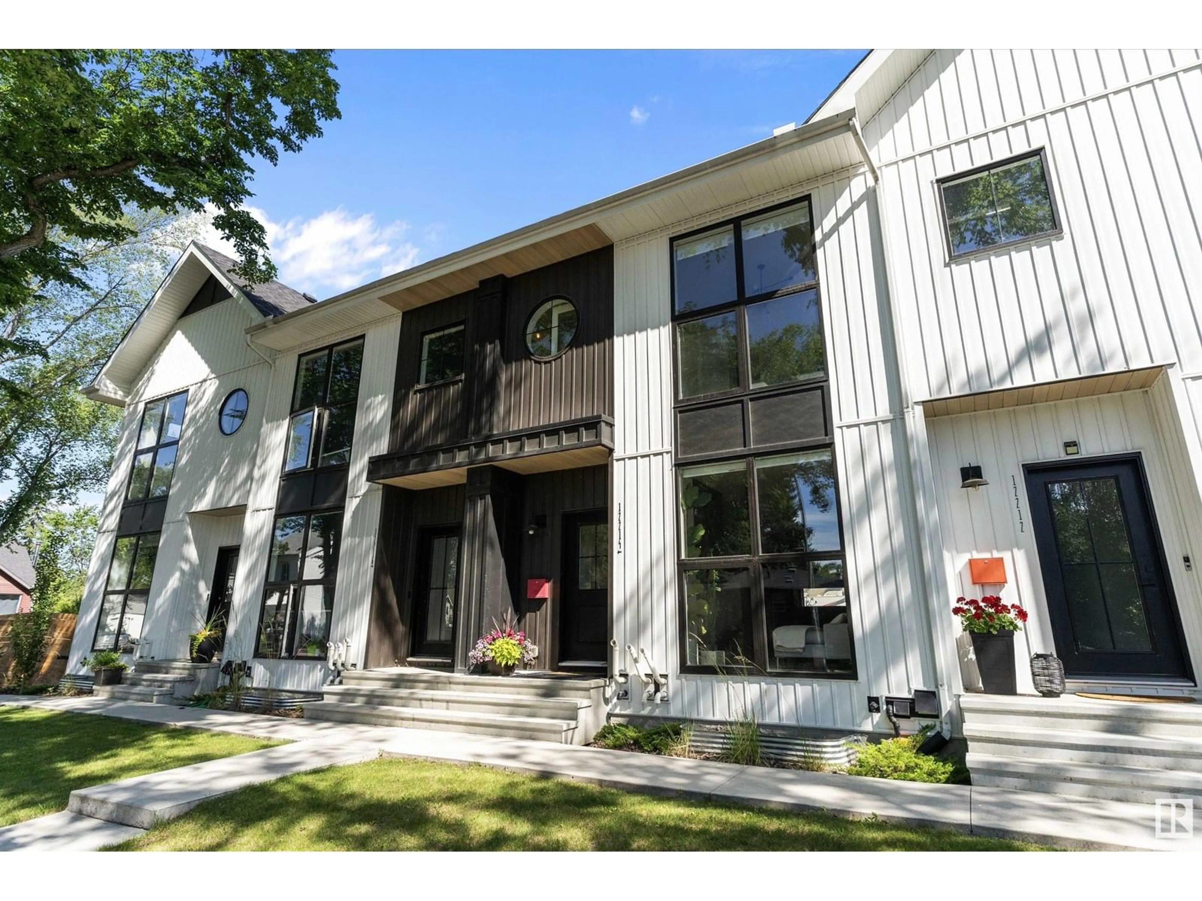 Home with vinyl exterior material, building for 12214 121 AV, Edmonton Alberta T5L3C3