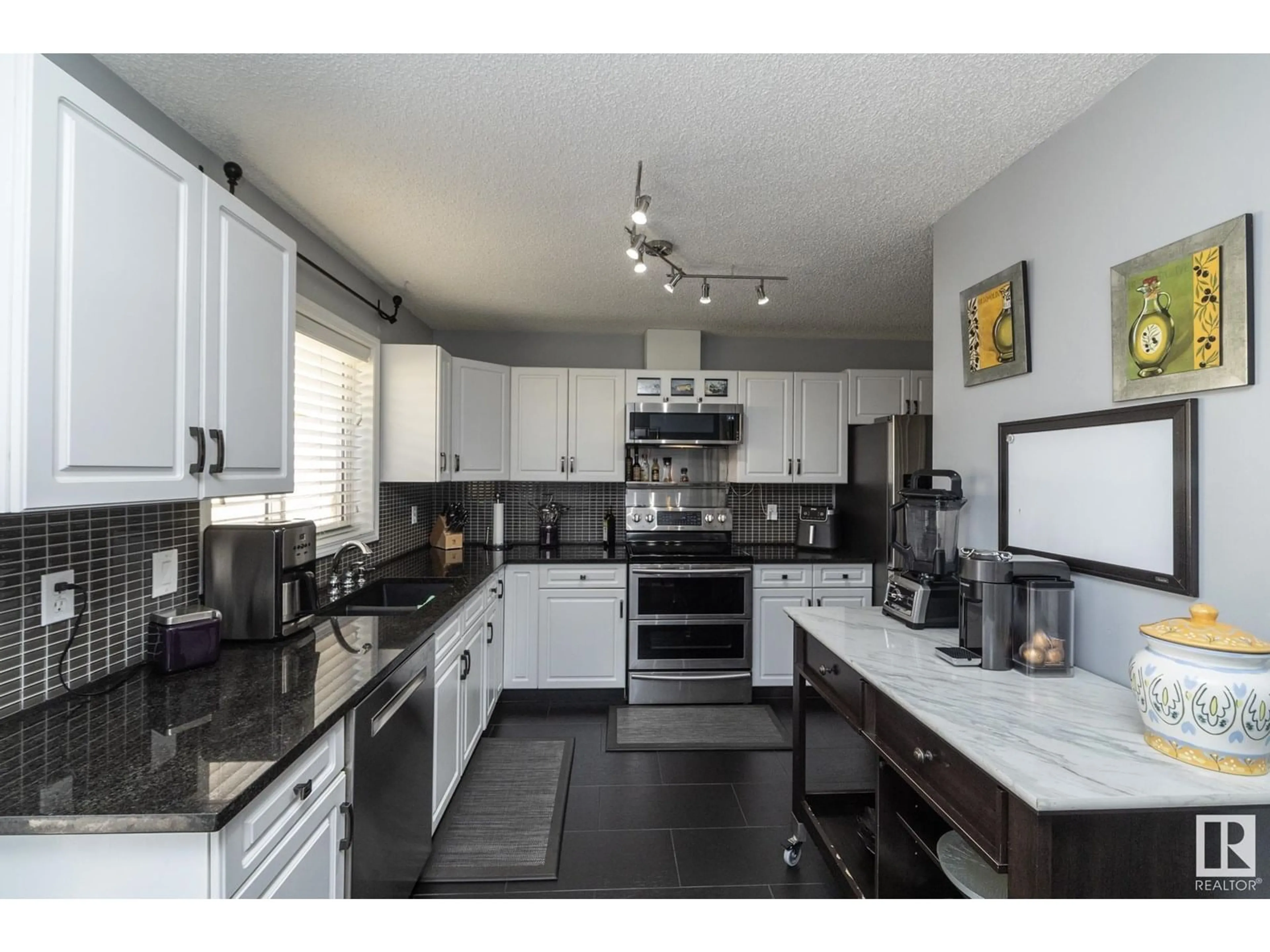 Open concept kitchen, unknown for #31 - 11717 9B AV, Edmonton Alberta T6J7B7