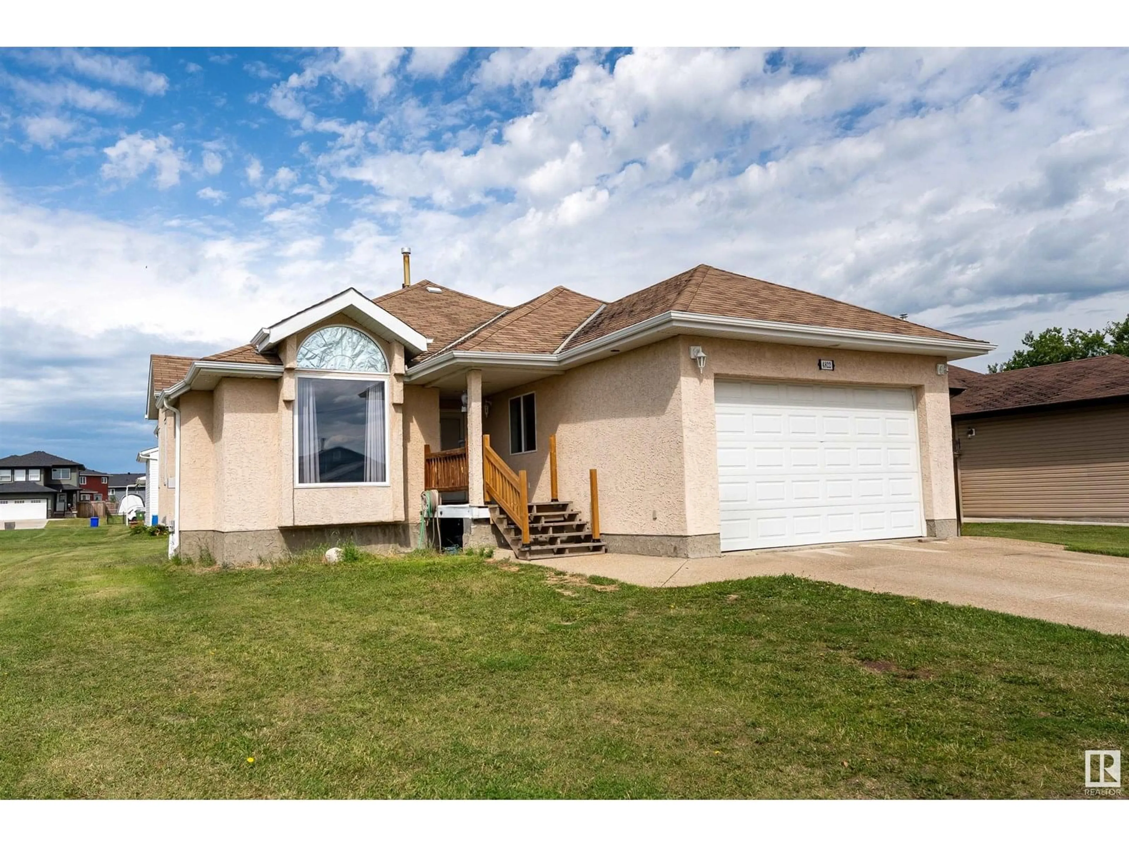 Home with vinyl exterior material, street for 4822 54 ST, Bruderheim Alberta T0B0S0
