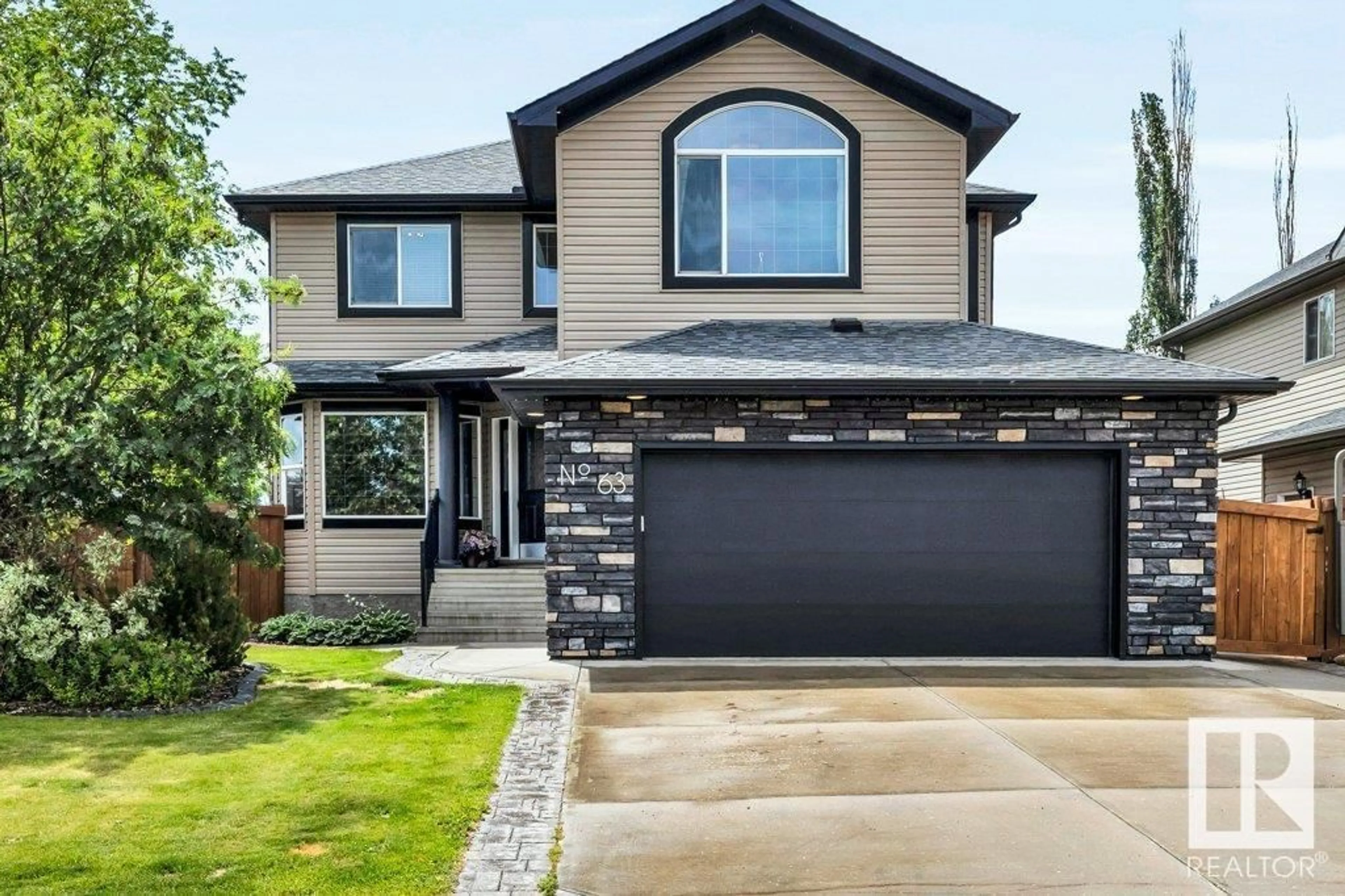Home with vinyl exterior material, street for 63 CREEKSIDE CL, Spruce Grove Alberta T7X4N9