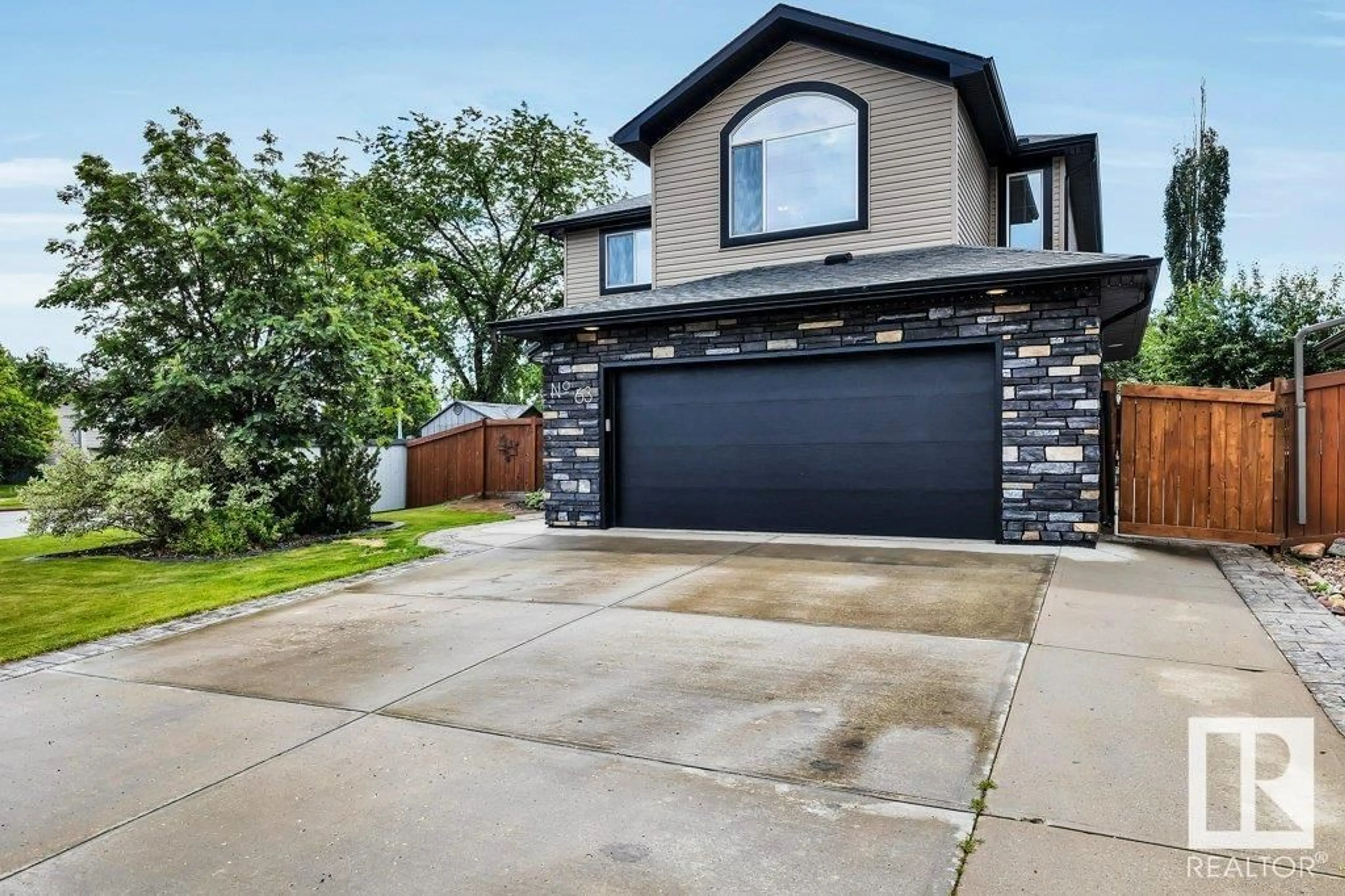 Home with brick exterior material, street for 63 CREEKSIDE CL, Spruce Grove Alberta T7X4N9