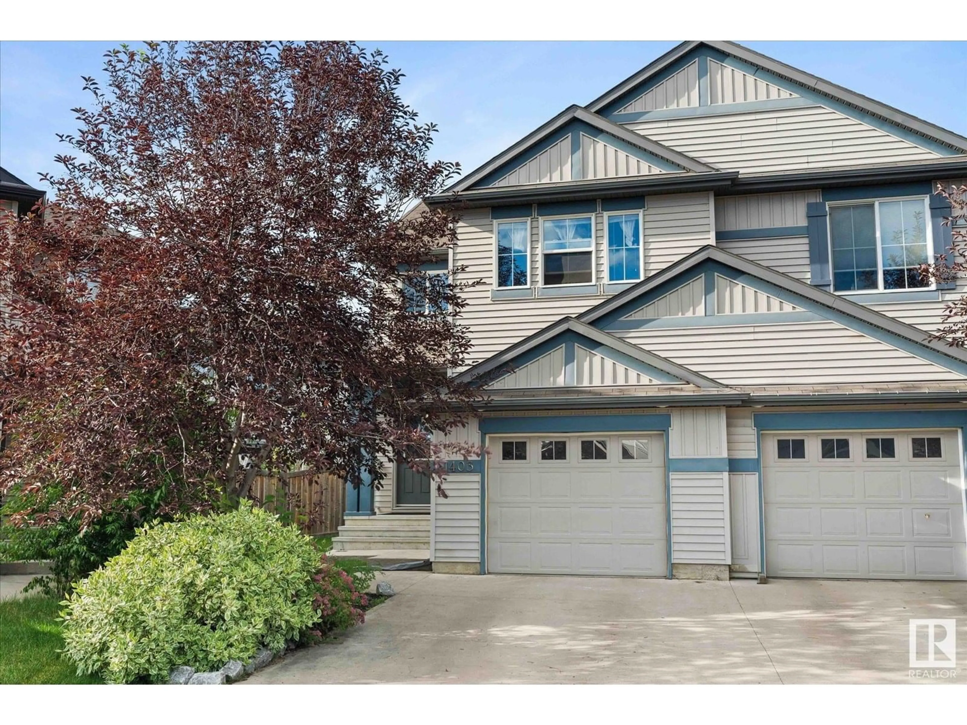Home with vinyl exterior material, street for 1403 53 ST, Edmonton Alberta T6X1S2