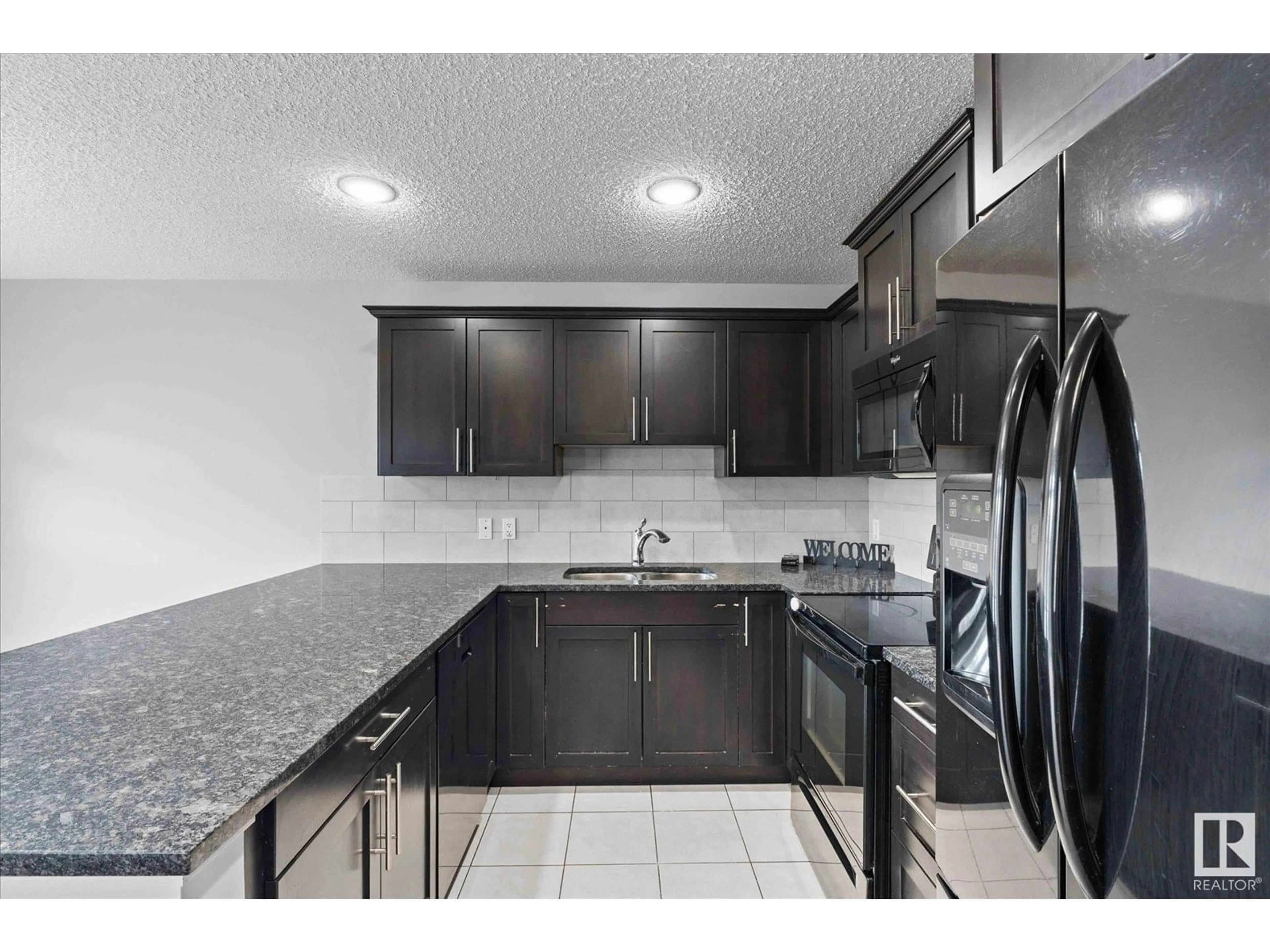 Standard kitchen, ceramic/tile floor for 1403 53 ST, Edmonton Alberta T6X1S2