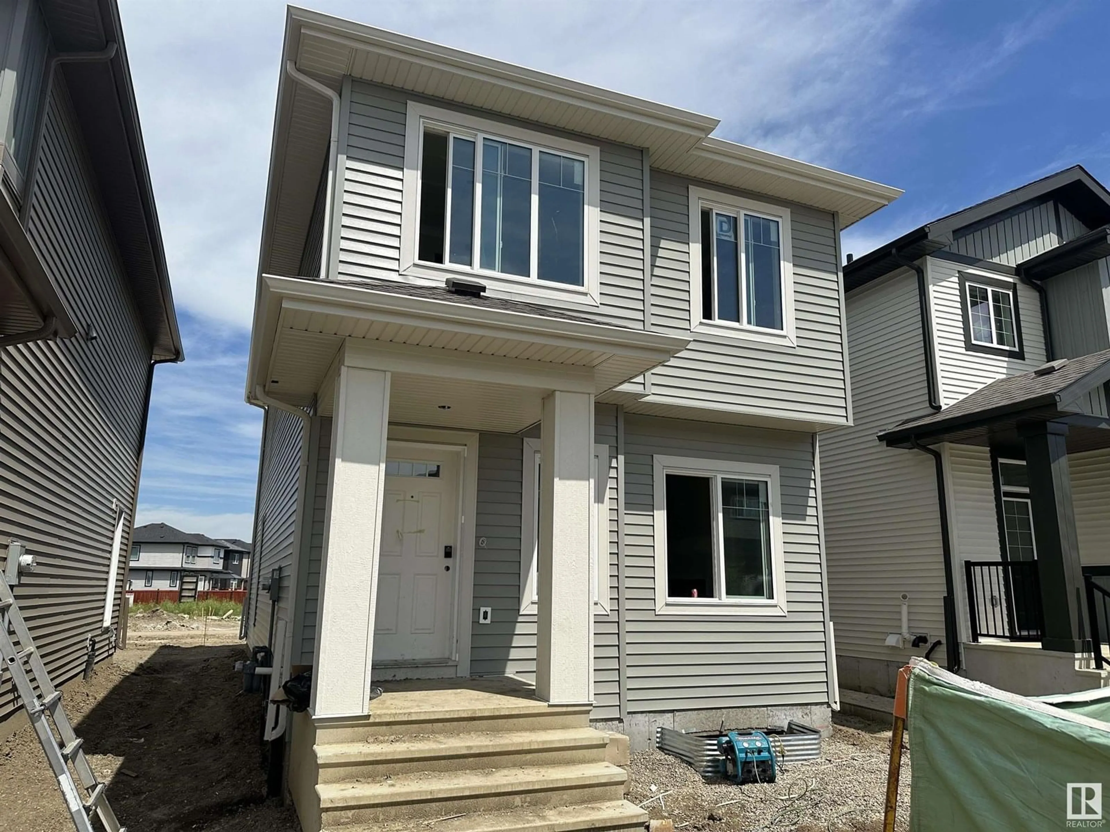 Home with vinyl exterior material, street for 10 HUNTER PL, Spruce Grove Alberta T7X3W3