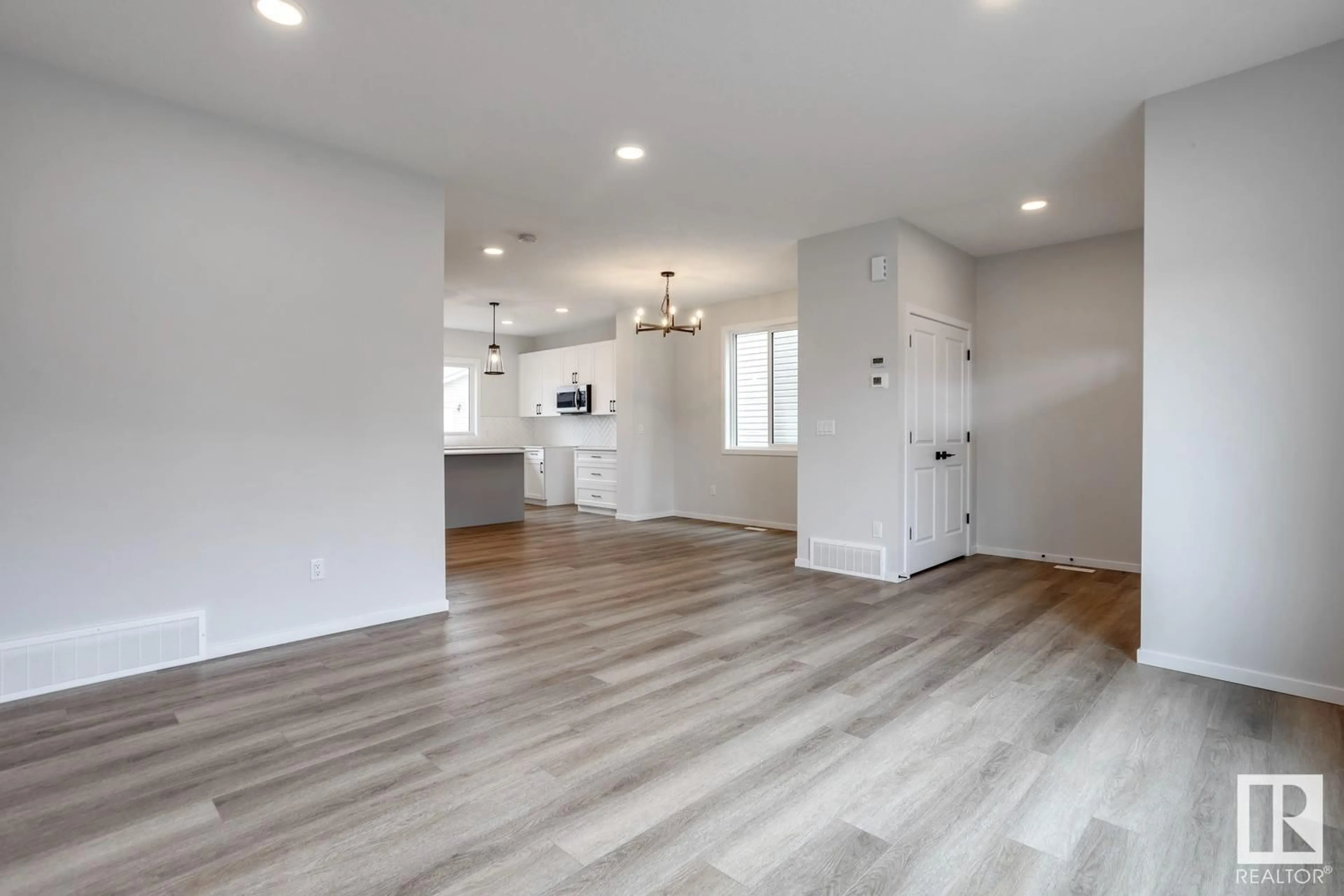 Open concept kitchen, wood/laminate floor for 10 HUNTER PL, Spruce Grove Alberta T7X3W3