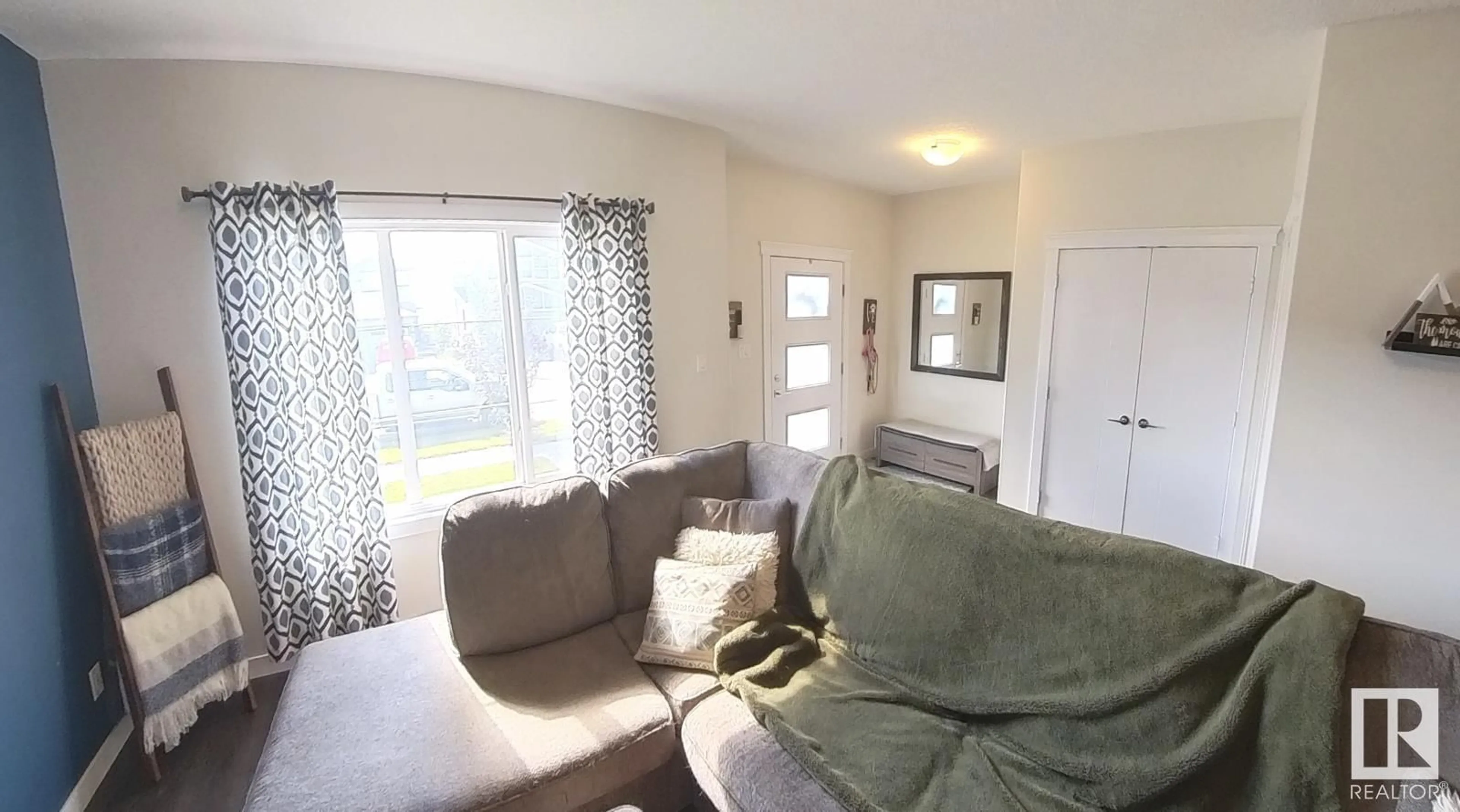 Living room with furniture, unknown for 725 BERG LO, Leduc Alberta T9E1G9