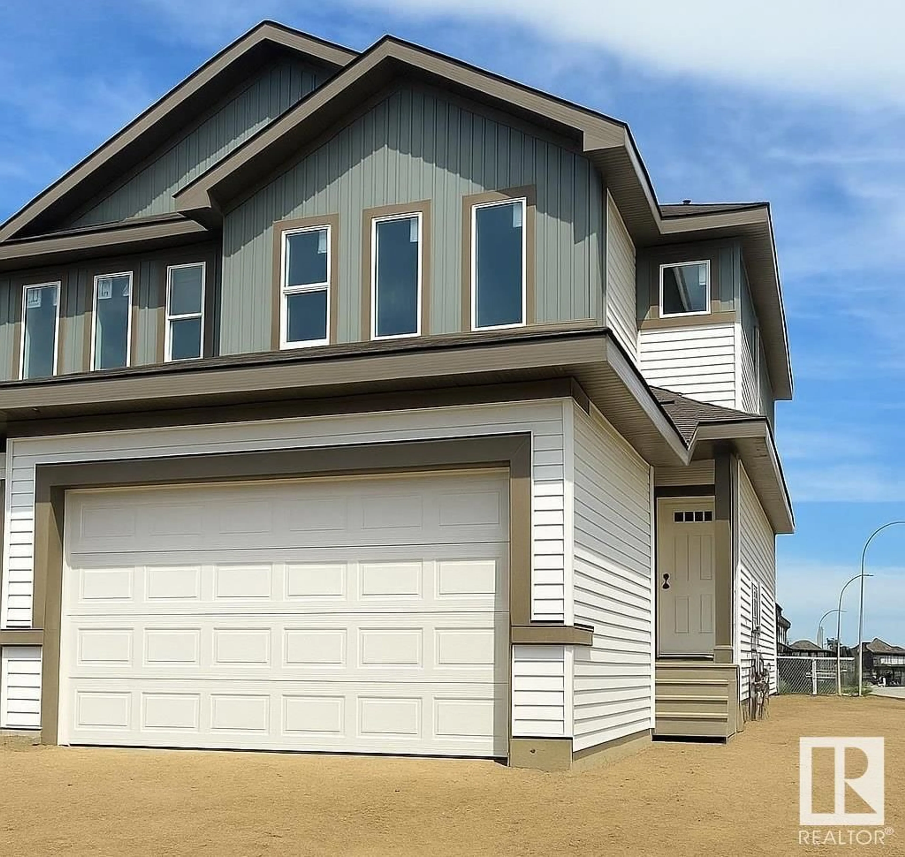 Home with vinyl exterior material, street for 1140 SOUTH CREEK WD, Stony Plain Alberta T7Z0J9