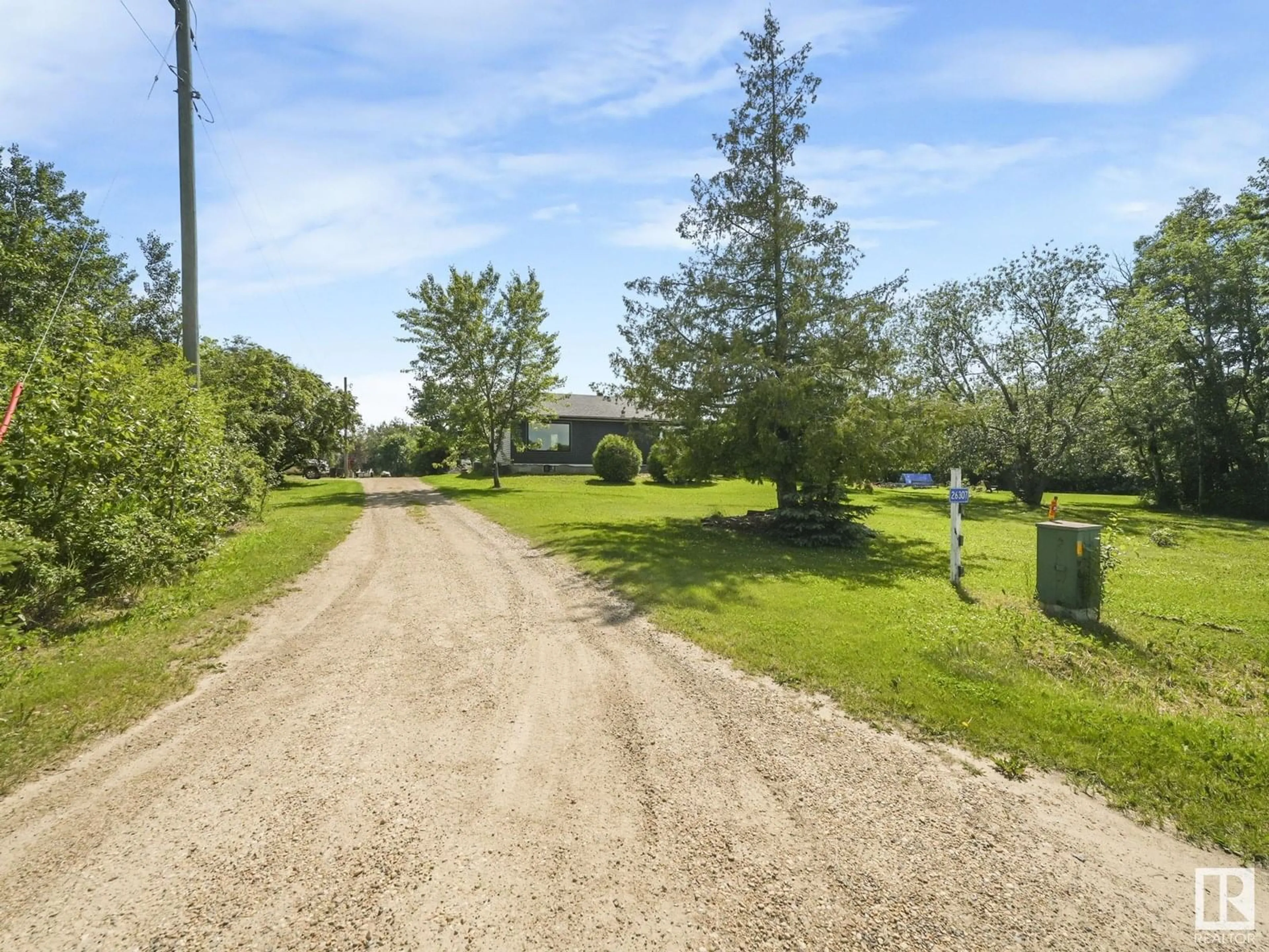 A pic from outside/outdoor area/front of a property/back of a property/a pic from drone, street for 26307 TWP ROAD 570, Rural Sturgeon County Alberta T8R2K7