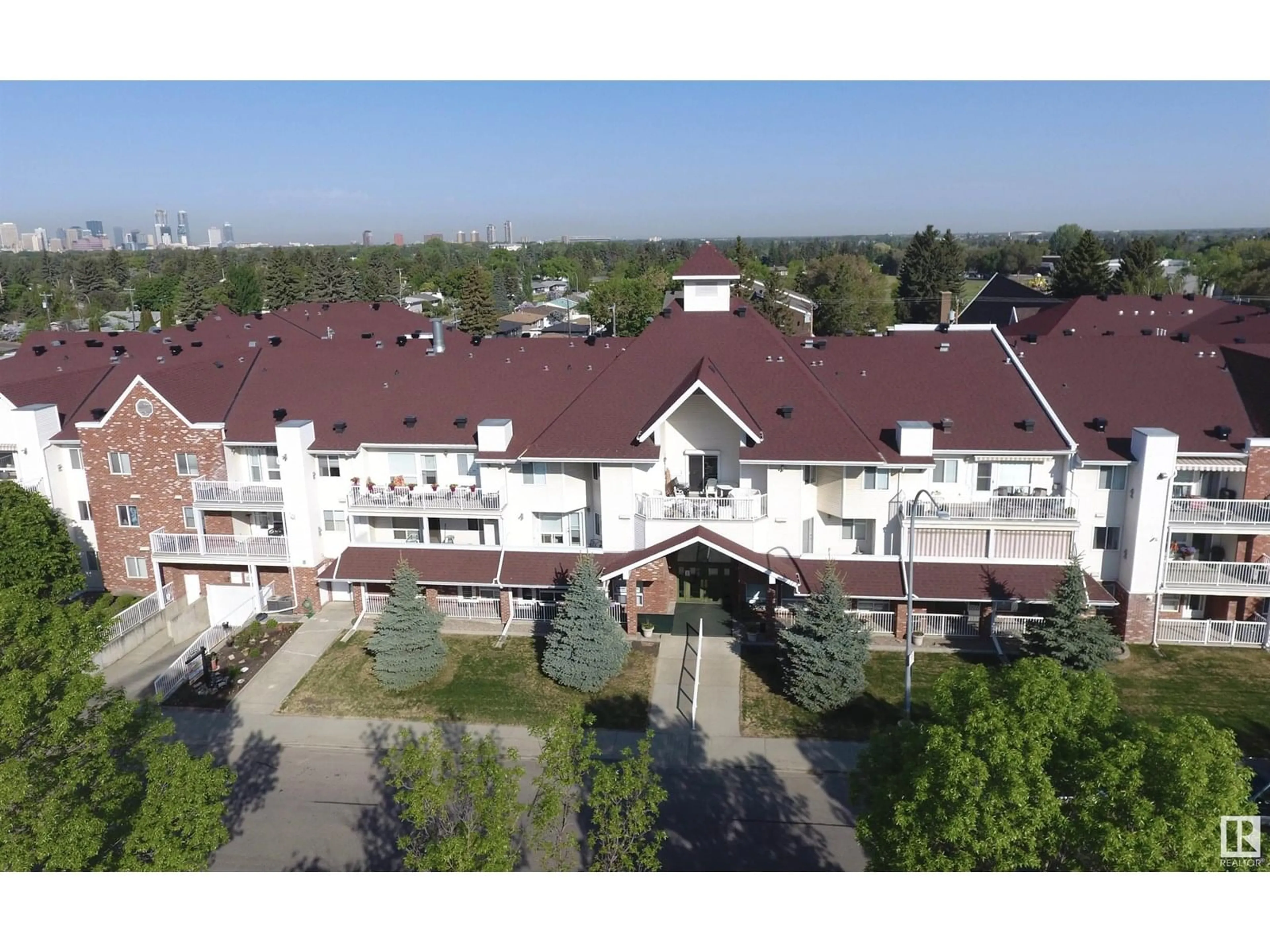 A pic from outside/outdoor area/front of a property/back of a property/a pic from drone, city buildings view from balcony for #310 - 6220 FULTON RD, Edmonton Alberta T6A3T4