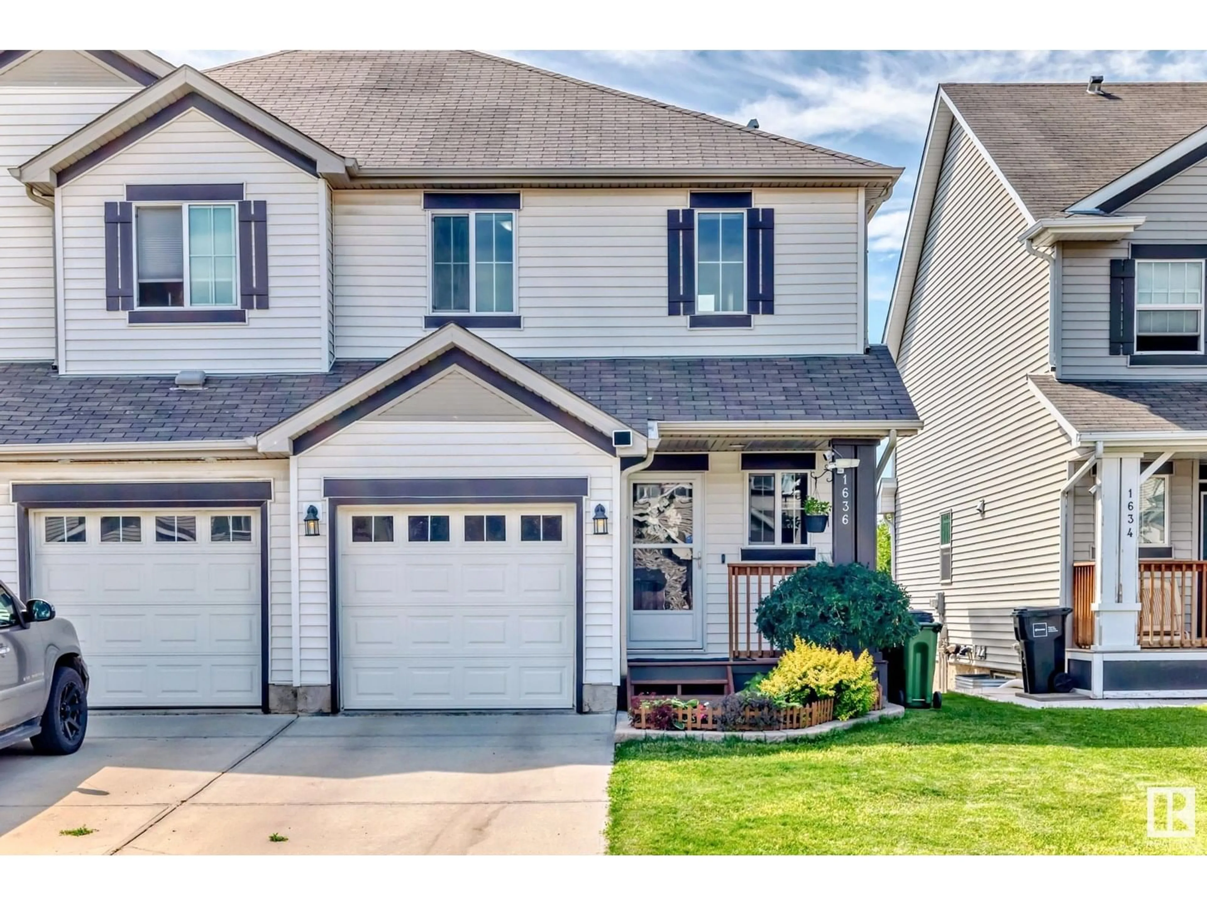 Home with vinyl exterior material, street for SW - 1636 65 ST, Edmonton Alberta T6X0M9