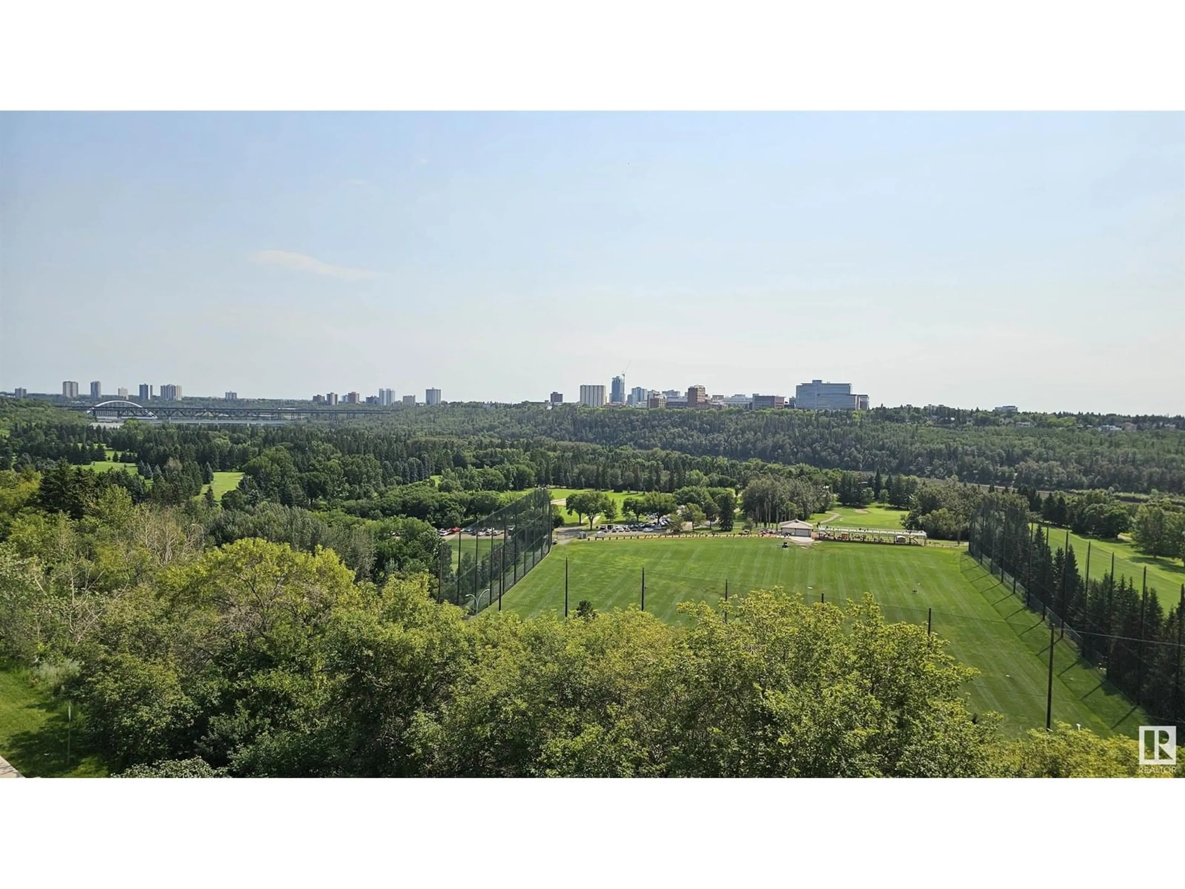 A pic from outside/outdoor area/front of a property/back of a property/a pic from drone, forest/trees view for #503 - 12207 JASPER AV, Edmonton Alberta T5N3K2