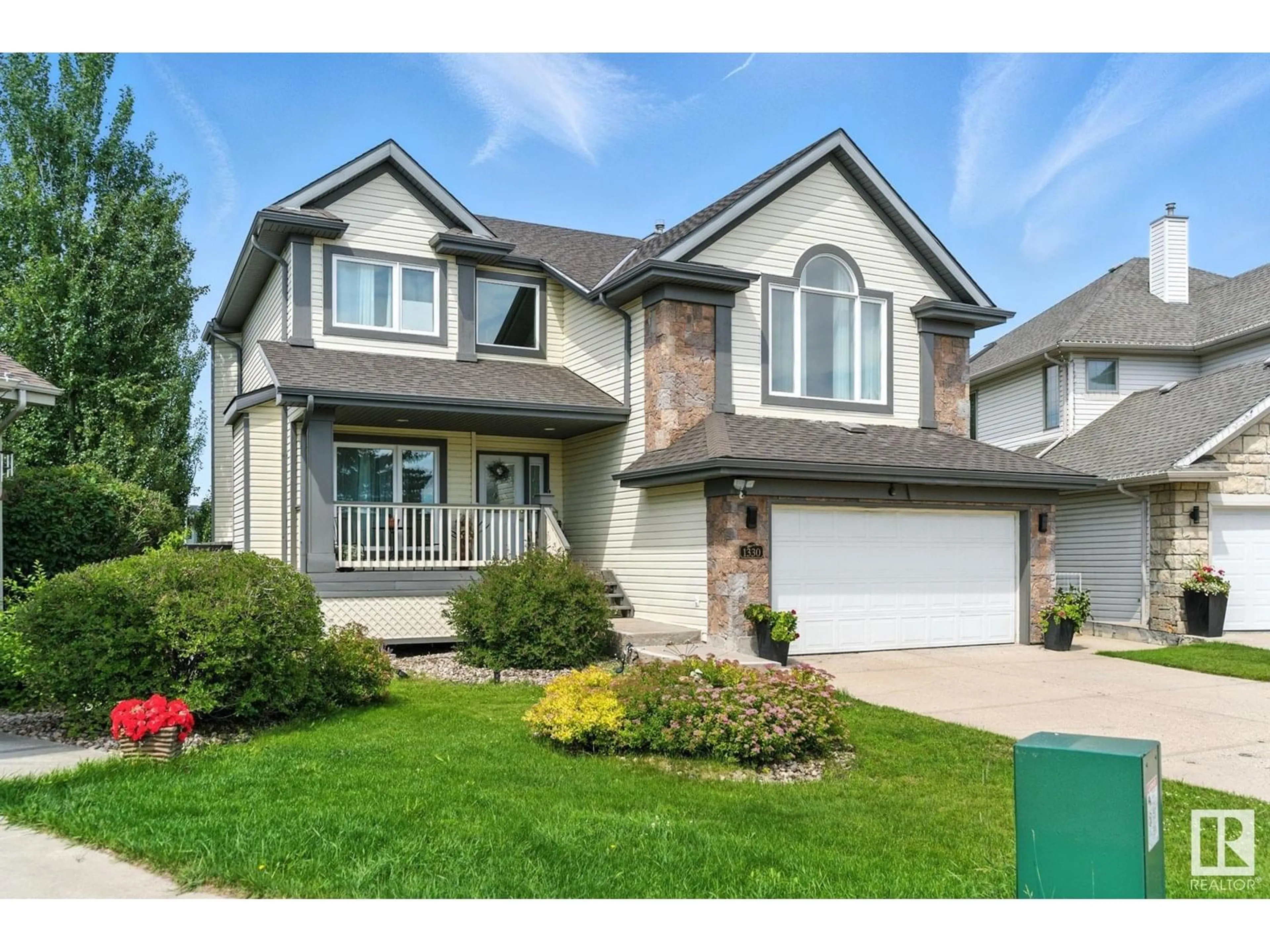 Home with vinyl exterior material, street for 1330 FALCONER RD, Edmonton Alberta T6R2V5