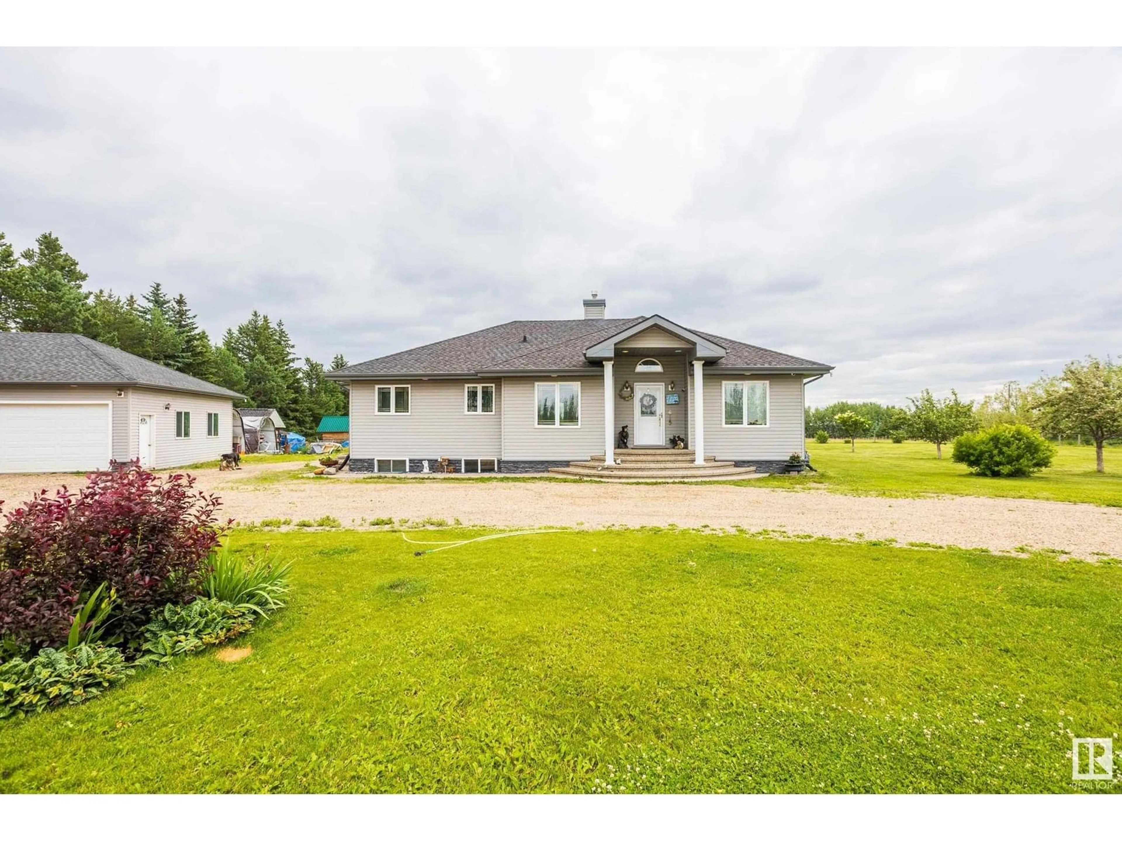 A pic from outside/outdoor area/front of a property/back of a property/a pic from drone, unknown for 15 - 55121 RGE ROAD 10, Rural Sturgeon County Alberta T8R0K3