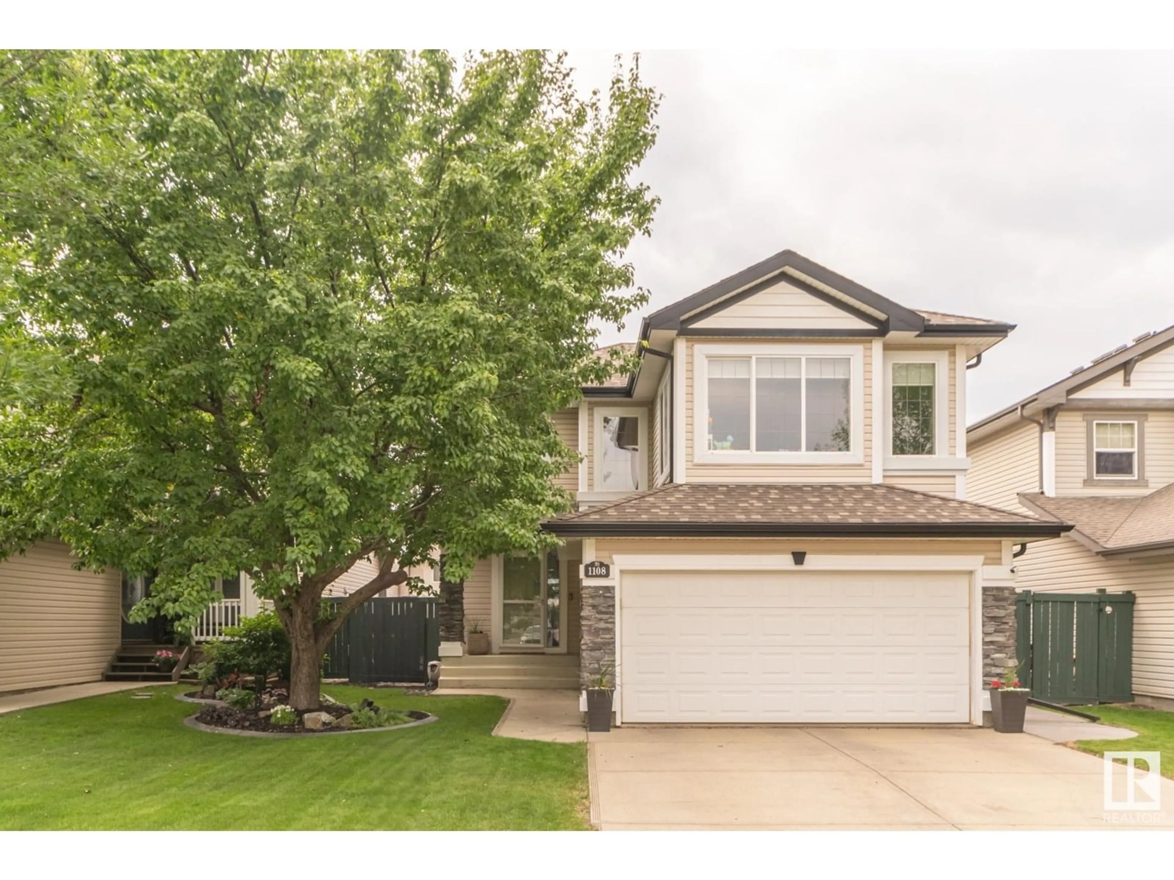 Home with vinyl exterior material, street for 1108 RUTHERFORD CL, Edmonton Alberta T6W1H4