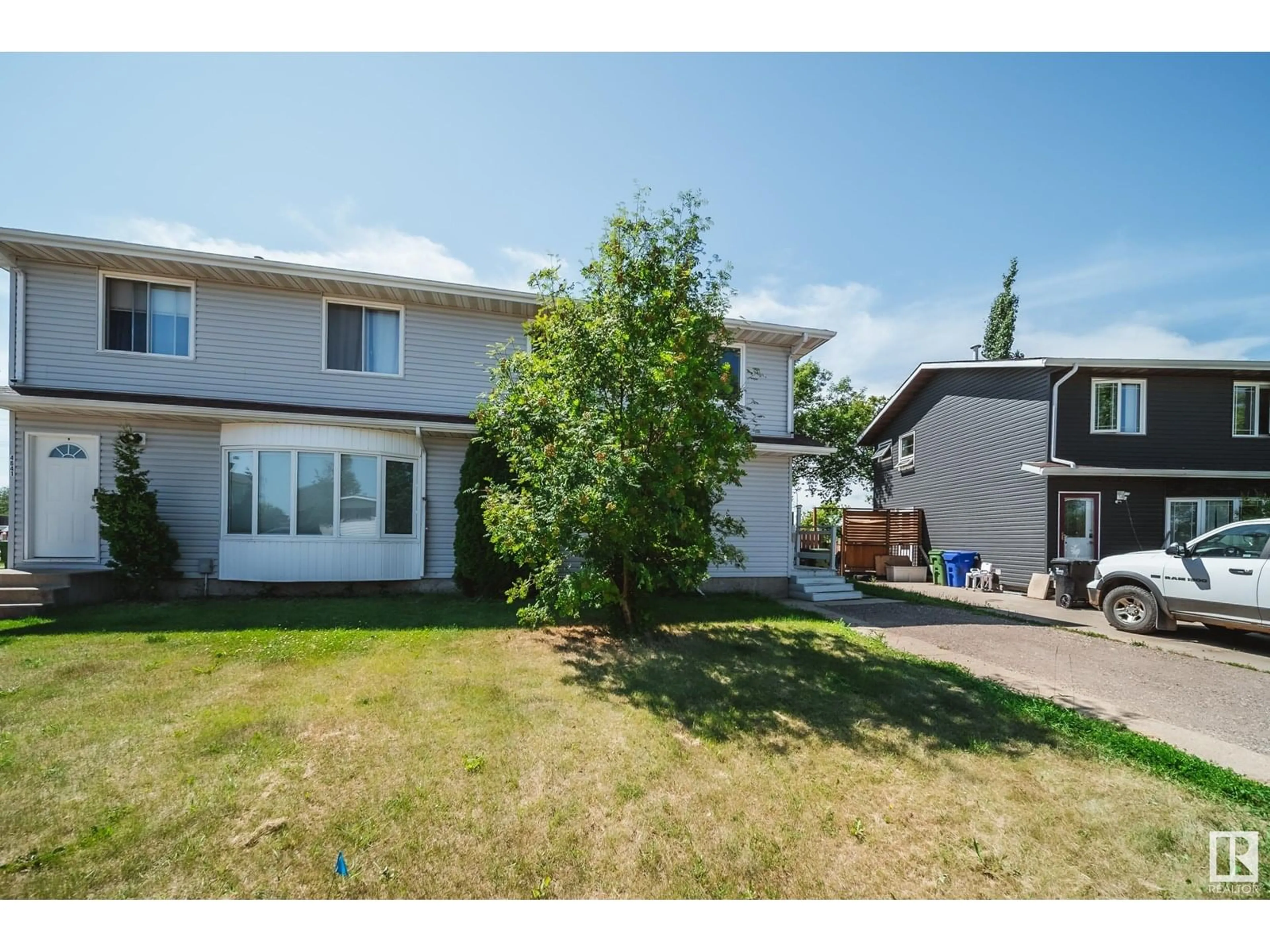 A pic from outside/outdoor area/front of a property/back of a property/a pic from drone, street for 4643 53 AV, Bruderheim Alberta T8L2T2