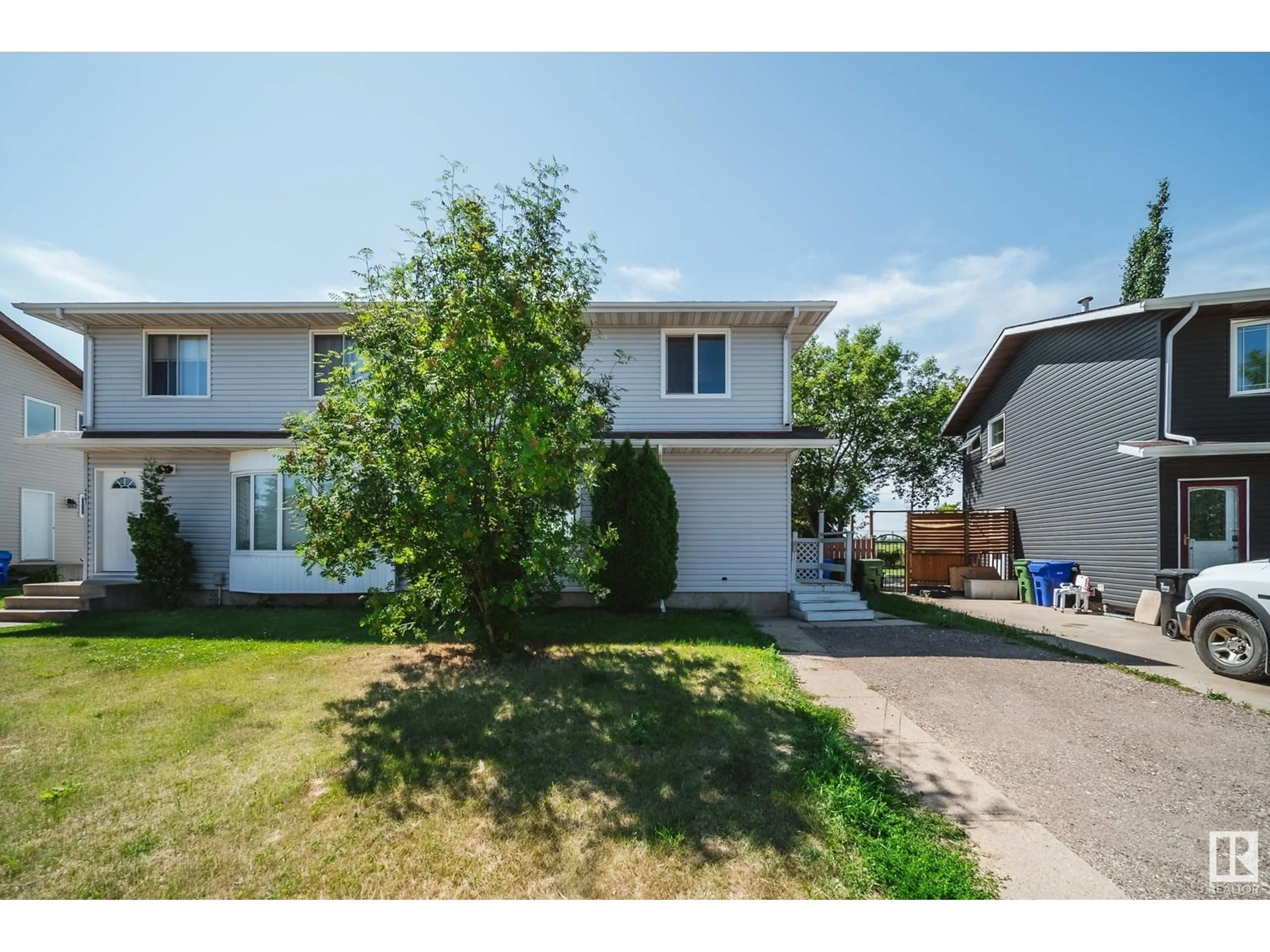 Home with vinyl exterior material, street for 4643 53 AV, Bruderheim Alberta T8L2T2