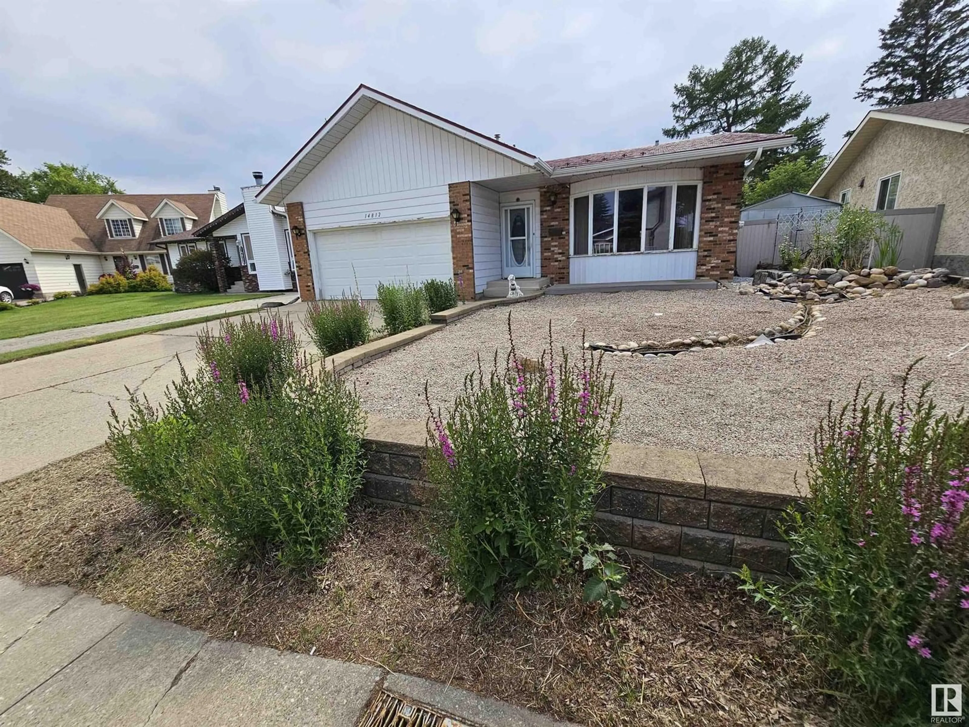 A pic from outside/outdoor area/front of a property/back of a property/a pic from drone, street for 14812 56 ST, Edmonton Alberta T5A4H6