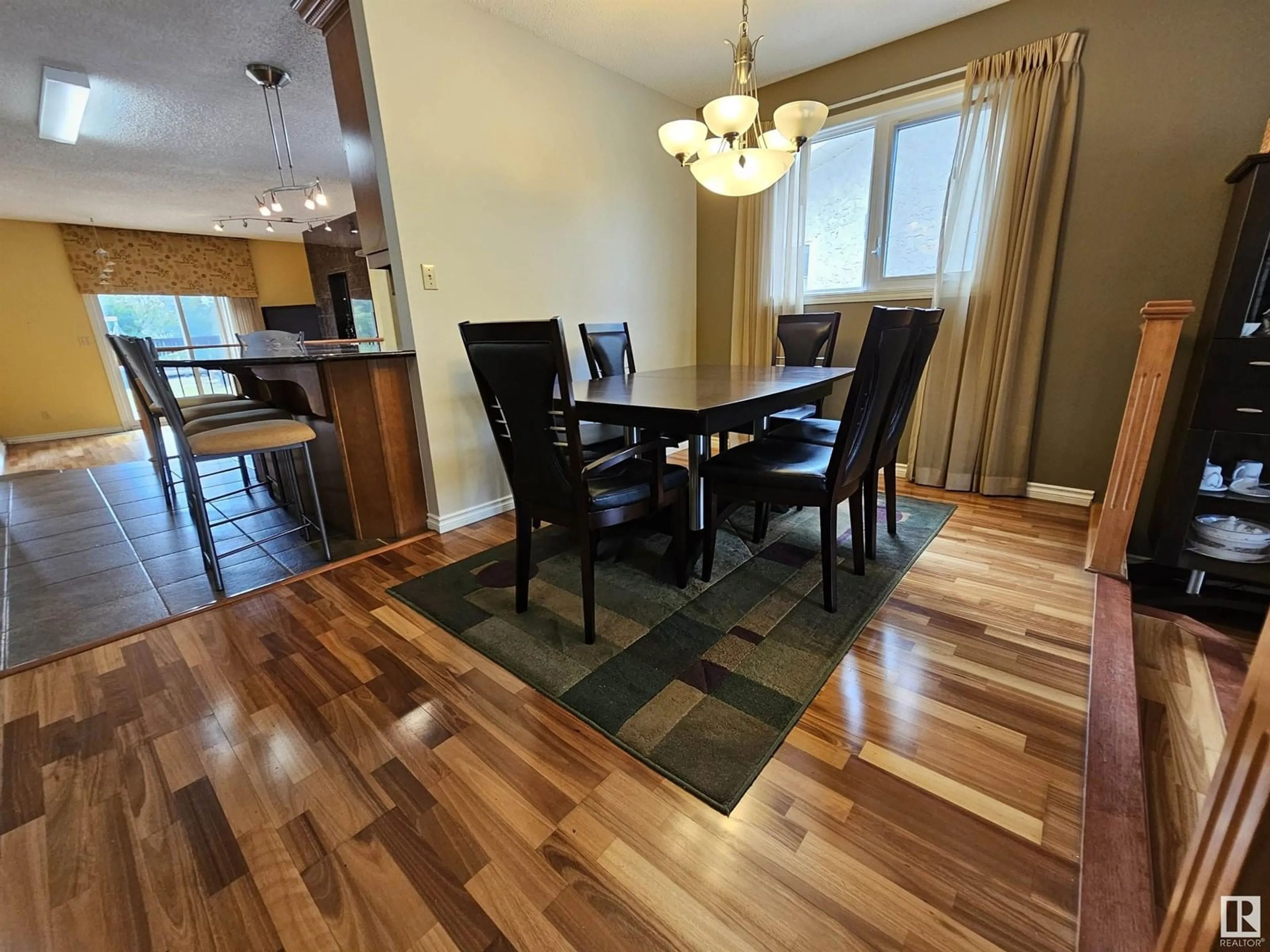 Dining room, wood/laminate floor for 14812 56 ST, Edmonton Alberta T5A4H6