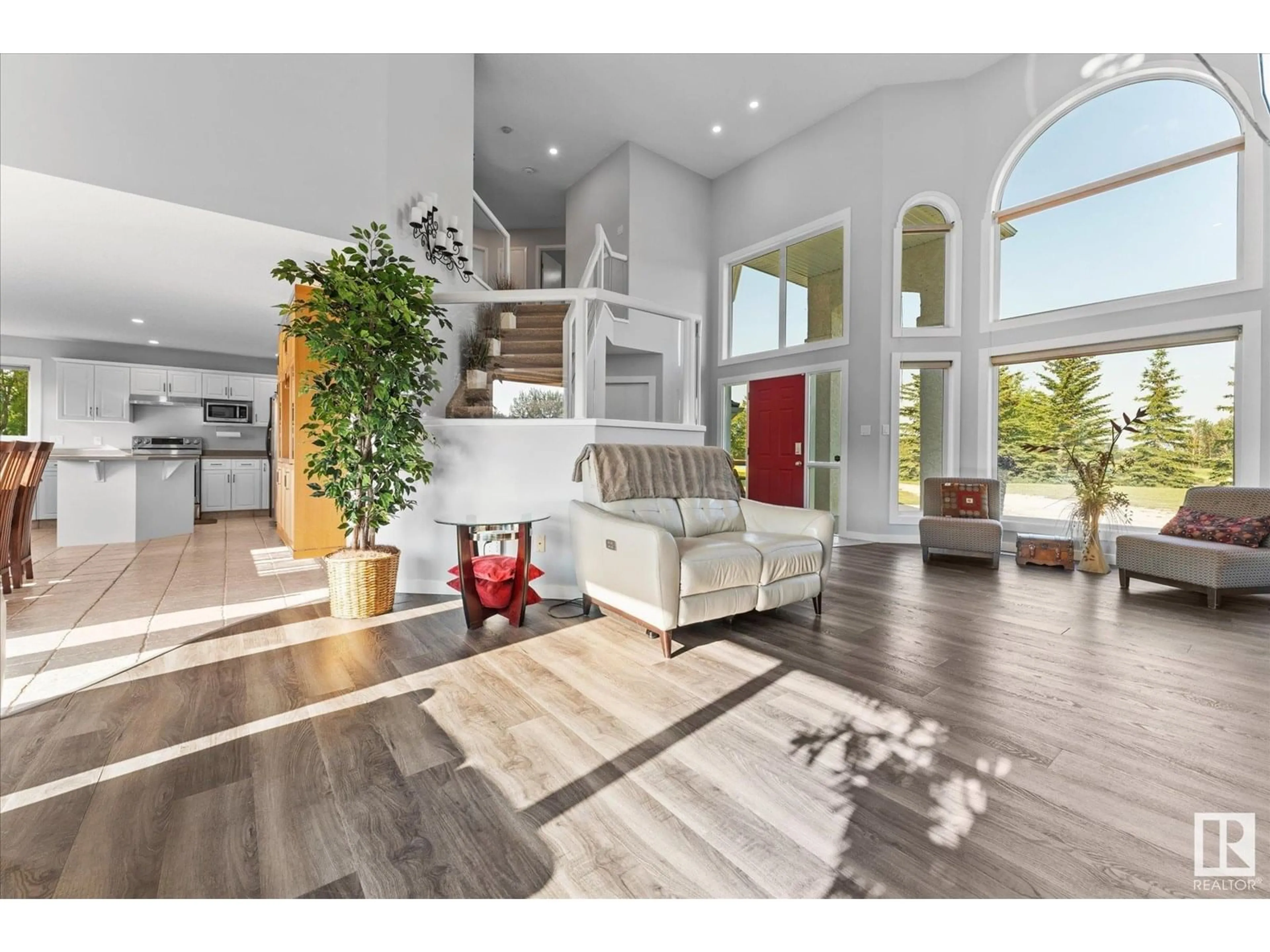Open concept kitchen, wood/laminate floor for 274 - 26 53503 RR, Rural Parkland County Alberta T7X3R9