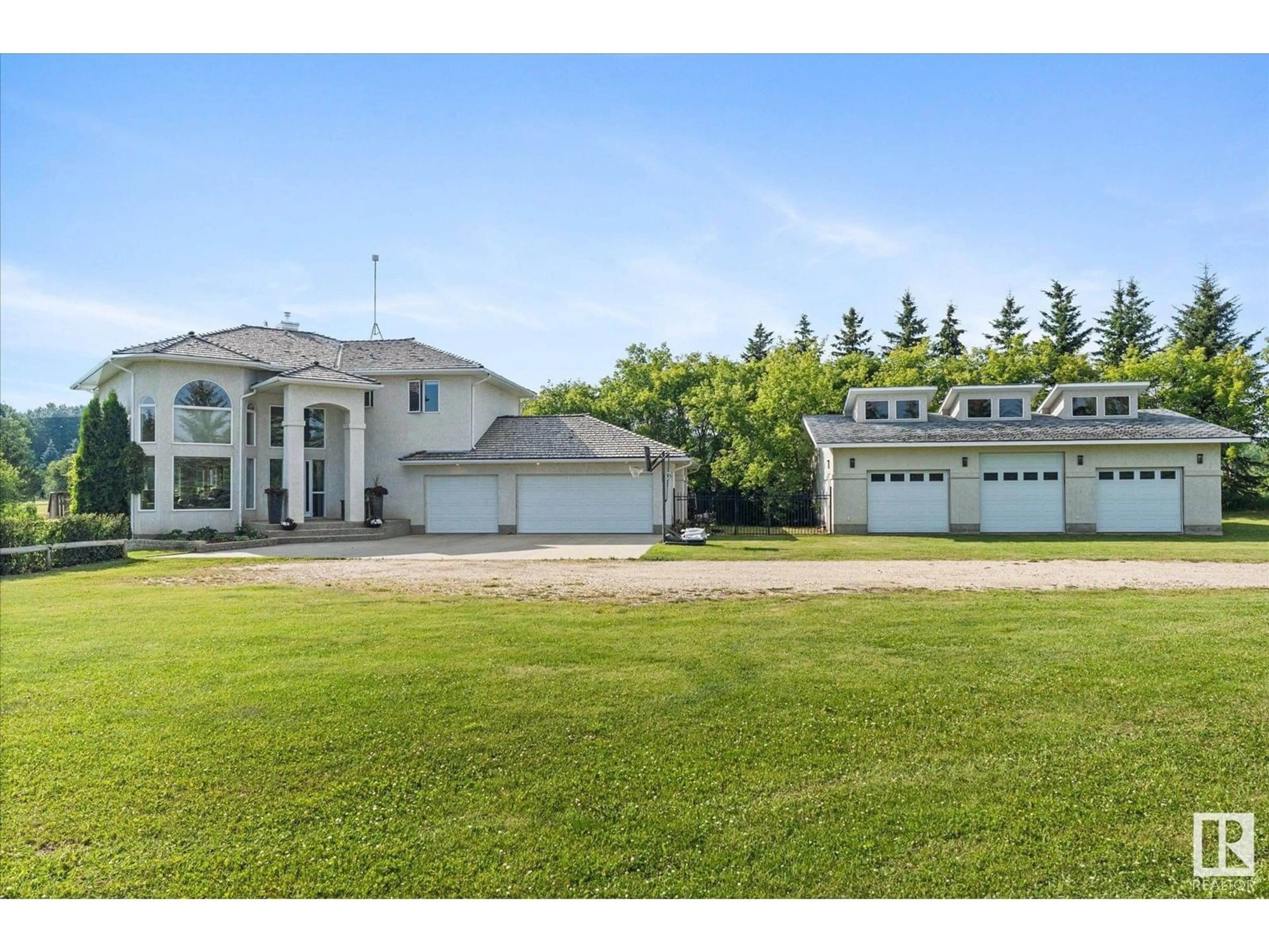 A pic from outside/outdoor area/front of a property/back of a property/a pic from drone, unknown for 274 - 26 53503 RR, Rural Parkland County Alberta T7X3R9