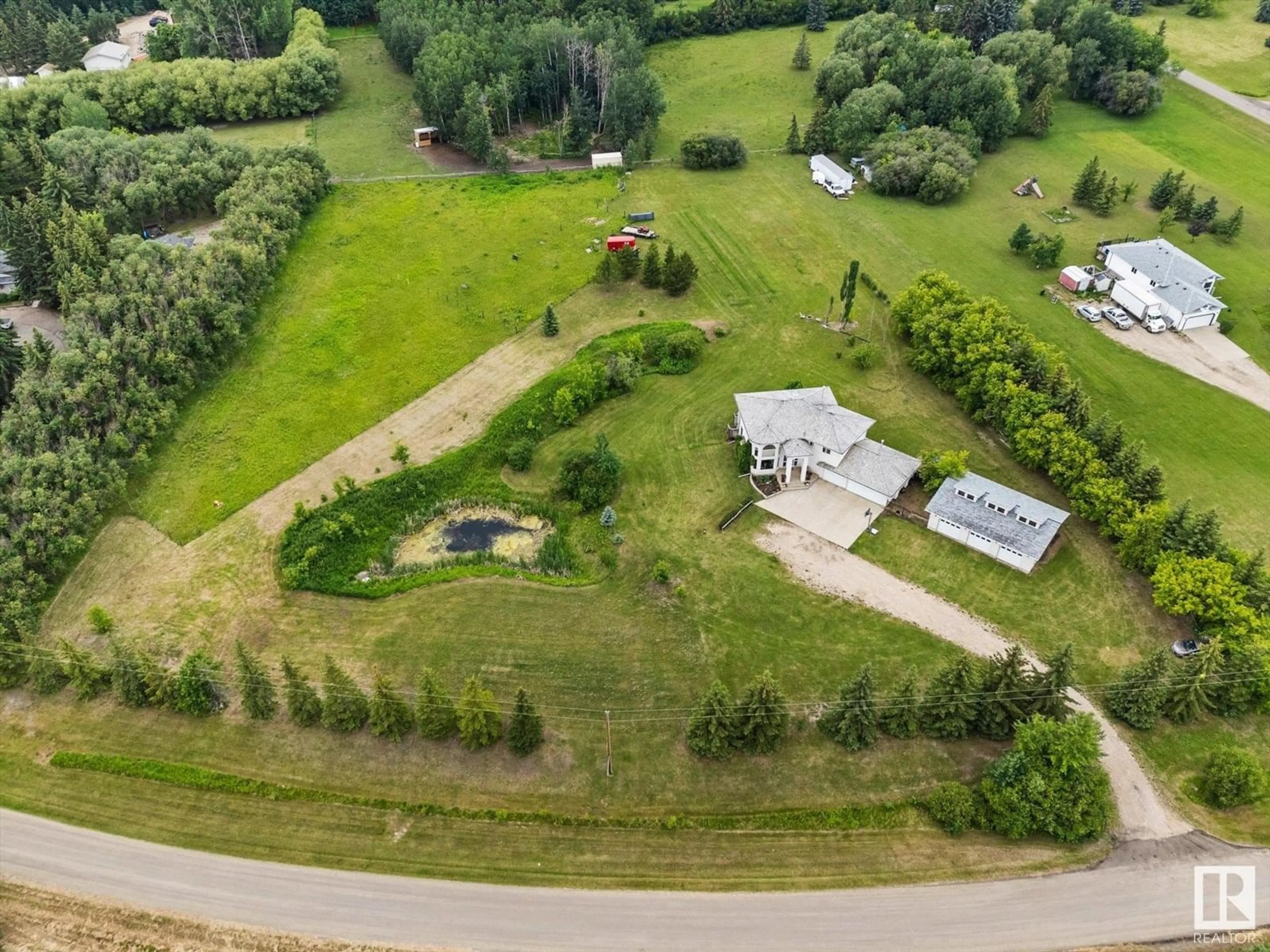 A pic from outside/outdoor area/front of a property/back of a property/a pic from drone, unknown for 274 - 26 53503 RR, Rural Parkland County Alberta T7X3R9