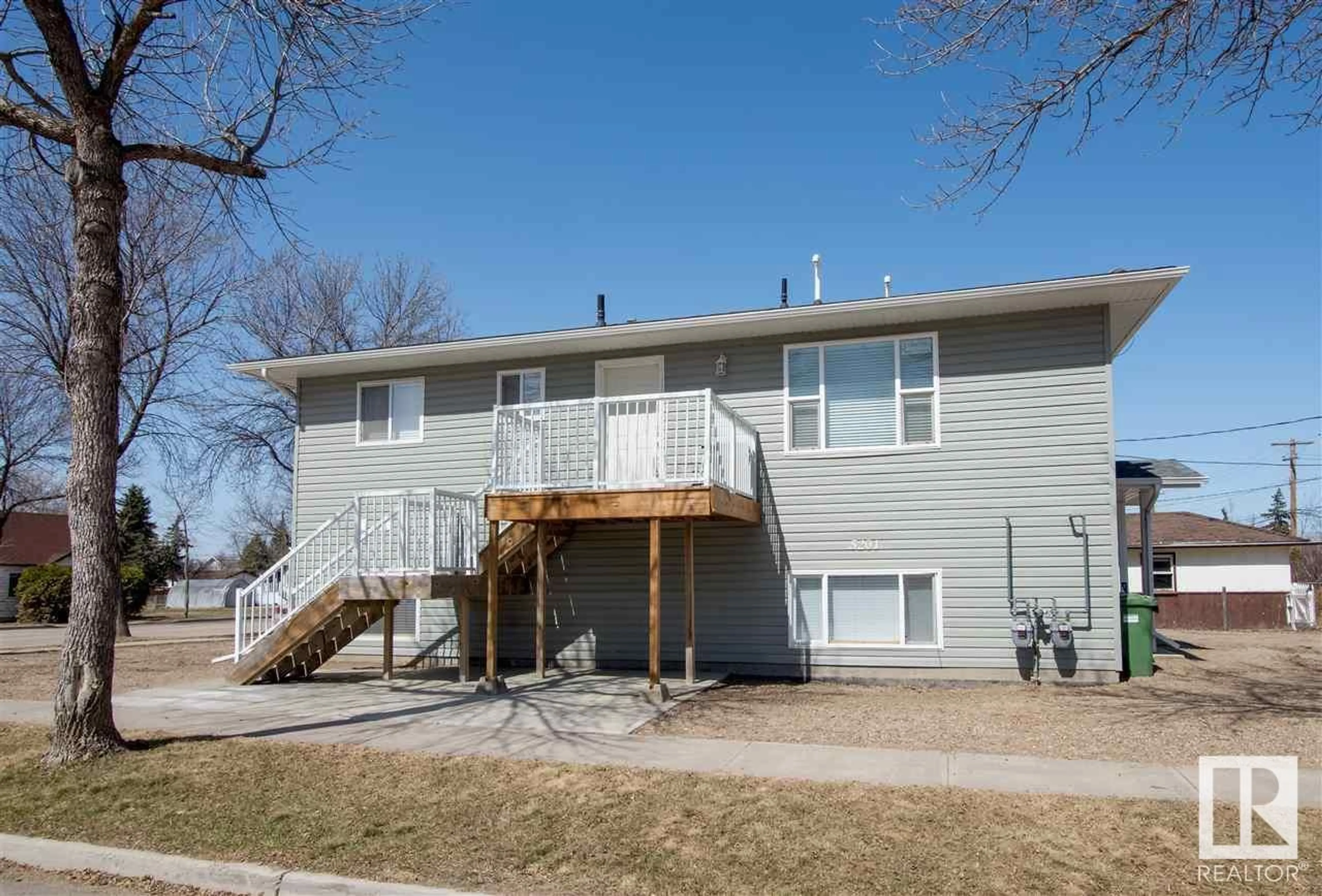 Home with vinyl exterior material, street for 5201 51 ST, Bonnyville Town Alberta T9N2G5