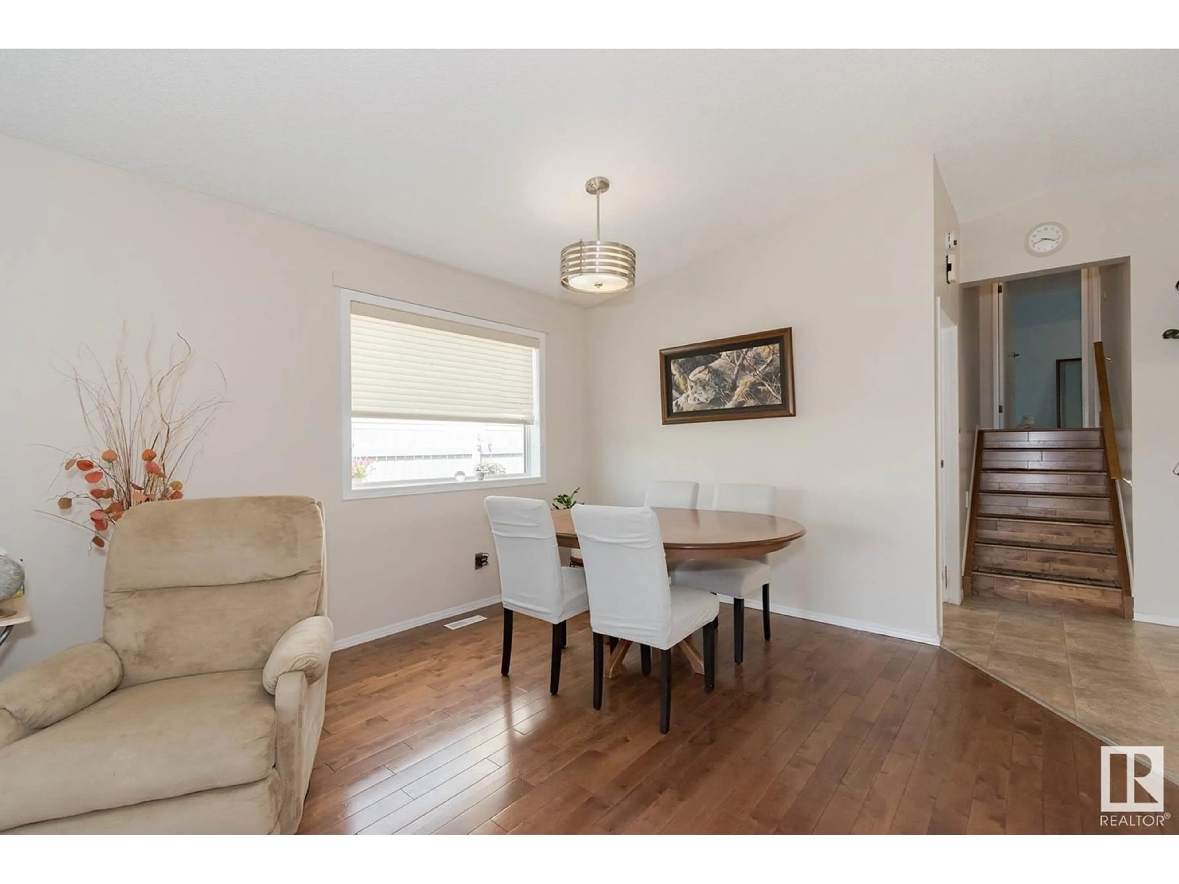 Dining room, wood/laminate floor for 3315 43 ST, Edmonton Alberta T6L5Z6