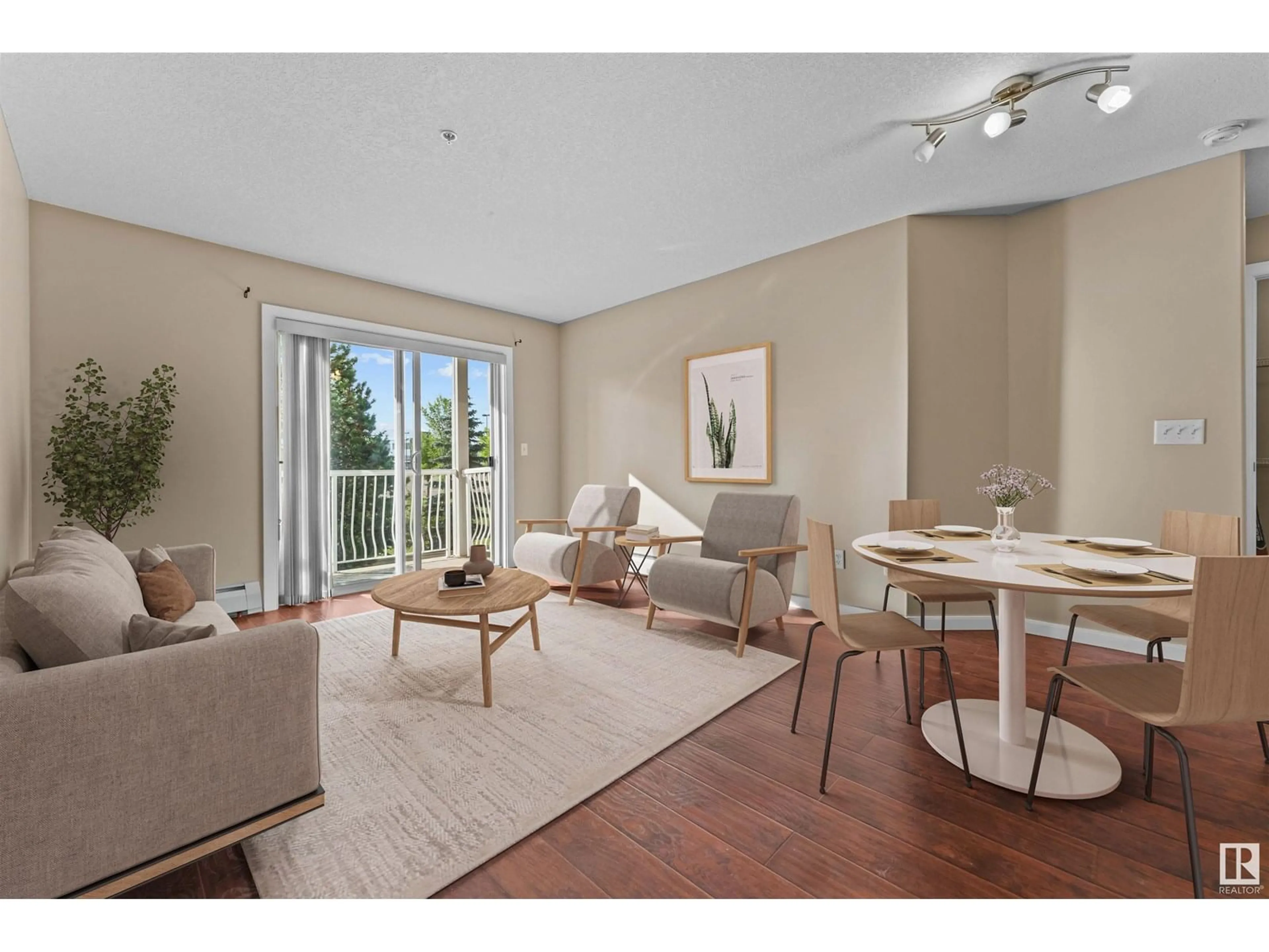 Living room with furniture, wood/laminate floor for #207 - 240 SPRUCE RIDGE RD, Spruce Grove Alberta T7X0G5