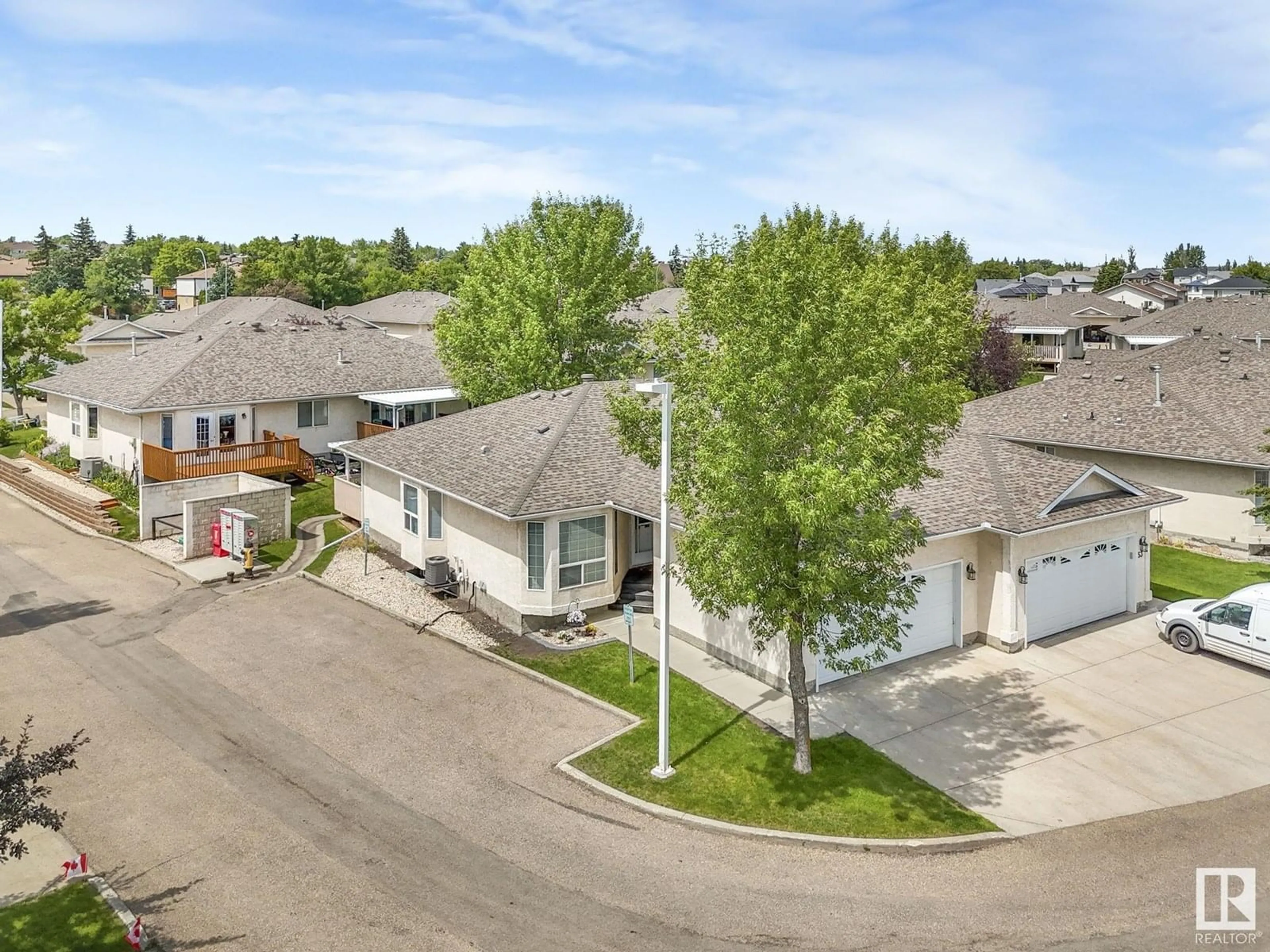 A pic from outside/outdoor area/front of a property/back of a property/a pic from drone, street for NW - 54 14428 MILLER BV, Edmonton Alberta T5Y2Y6