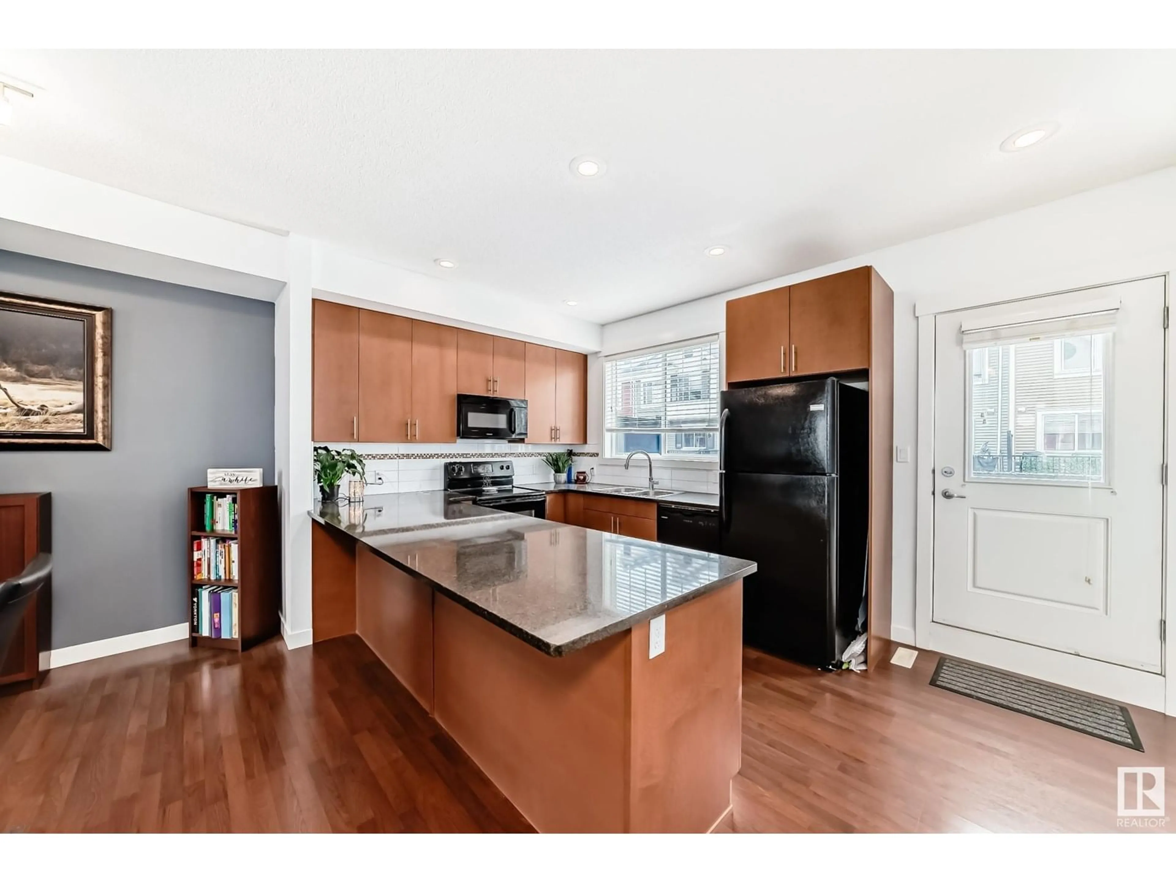 Open concept kitchen, unknown for 92 8315 180 AV NW, Edmonton Alberta T5Z0J2