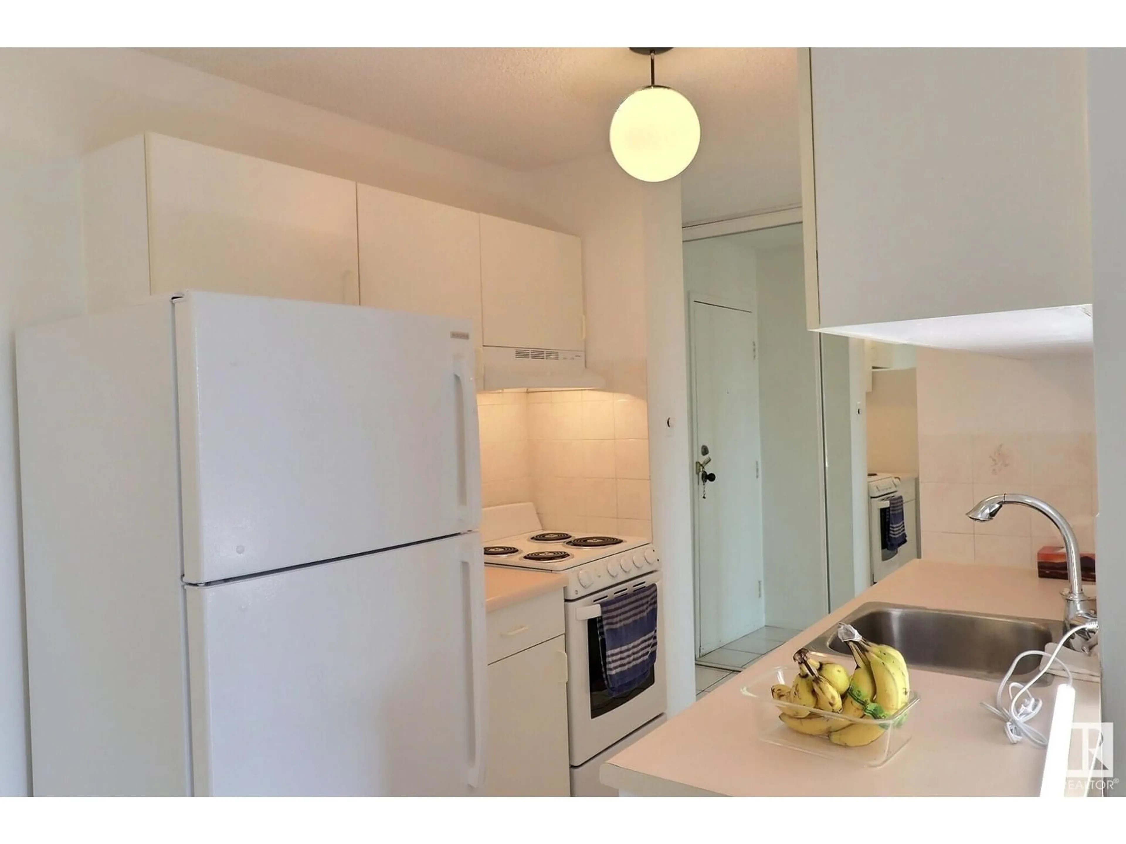 Standard kitchen, wood/laminate floor for 9028 NW - 805 JASPER AV, Edmonton Alberta T5H3Y6