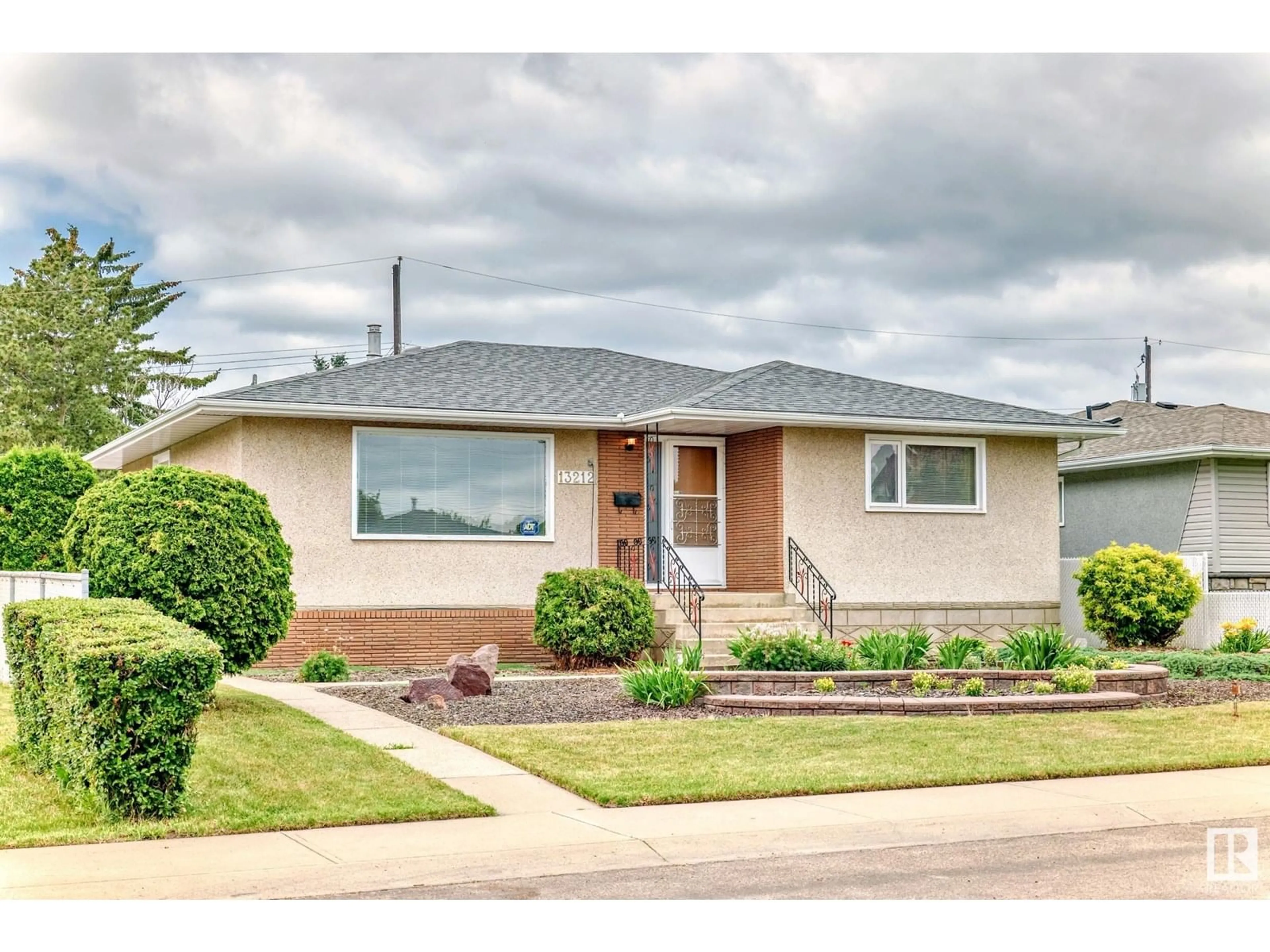 Home with brick exterior material, street for NW - 13212 117 ST, Edmonton Alberta T5E5K2